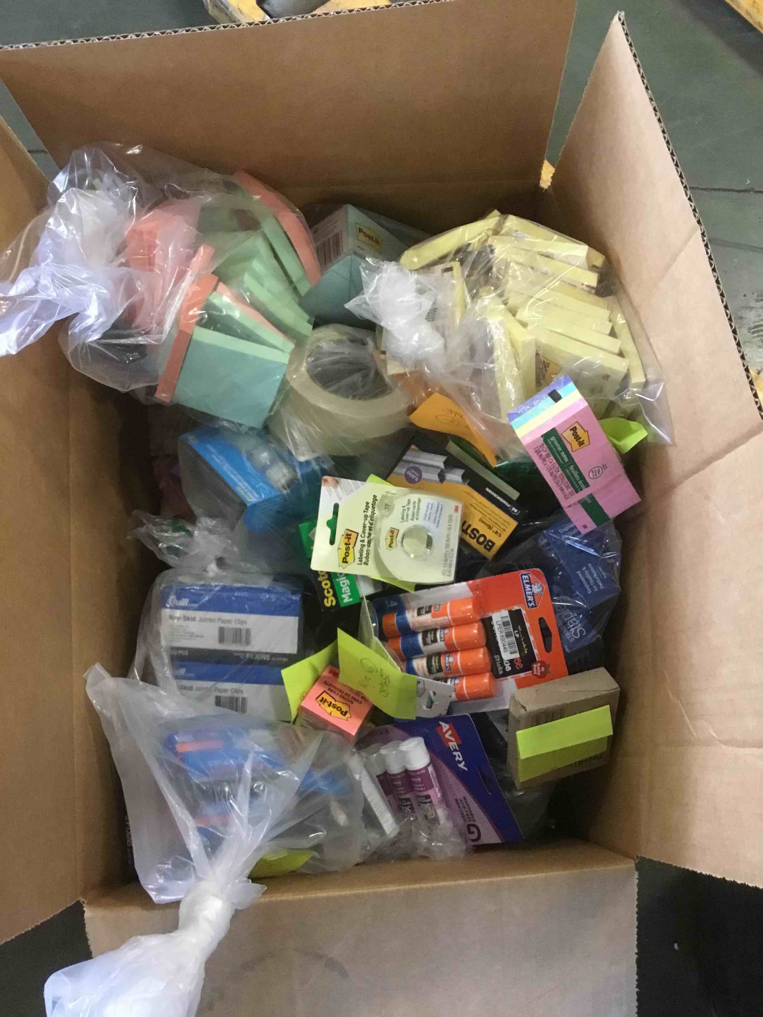 Assorted Box of Office Supplies (Post-it’s, glue, staples, tape, paper clips, etc)