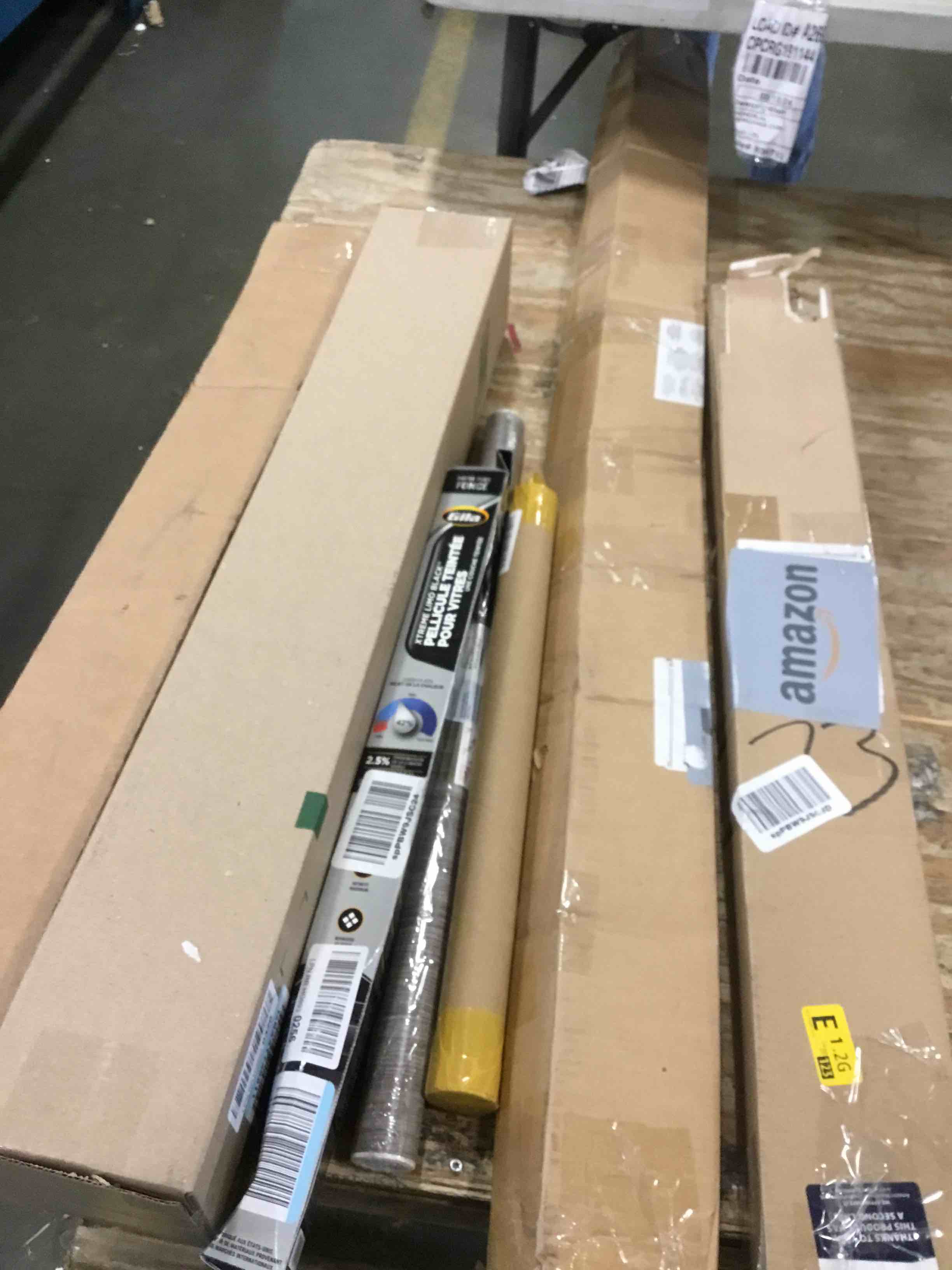 assorted miscellaneous items (curtain rods, wall paper and more)