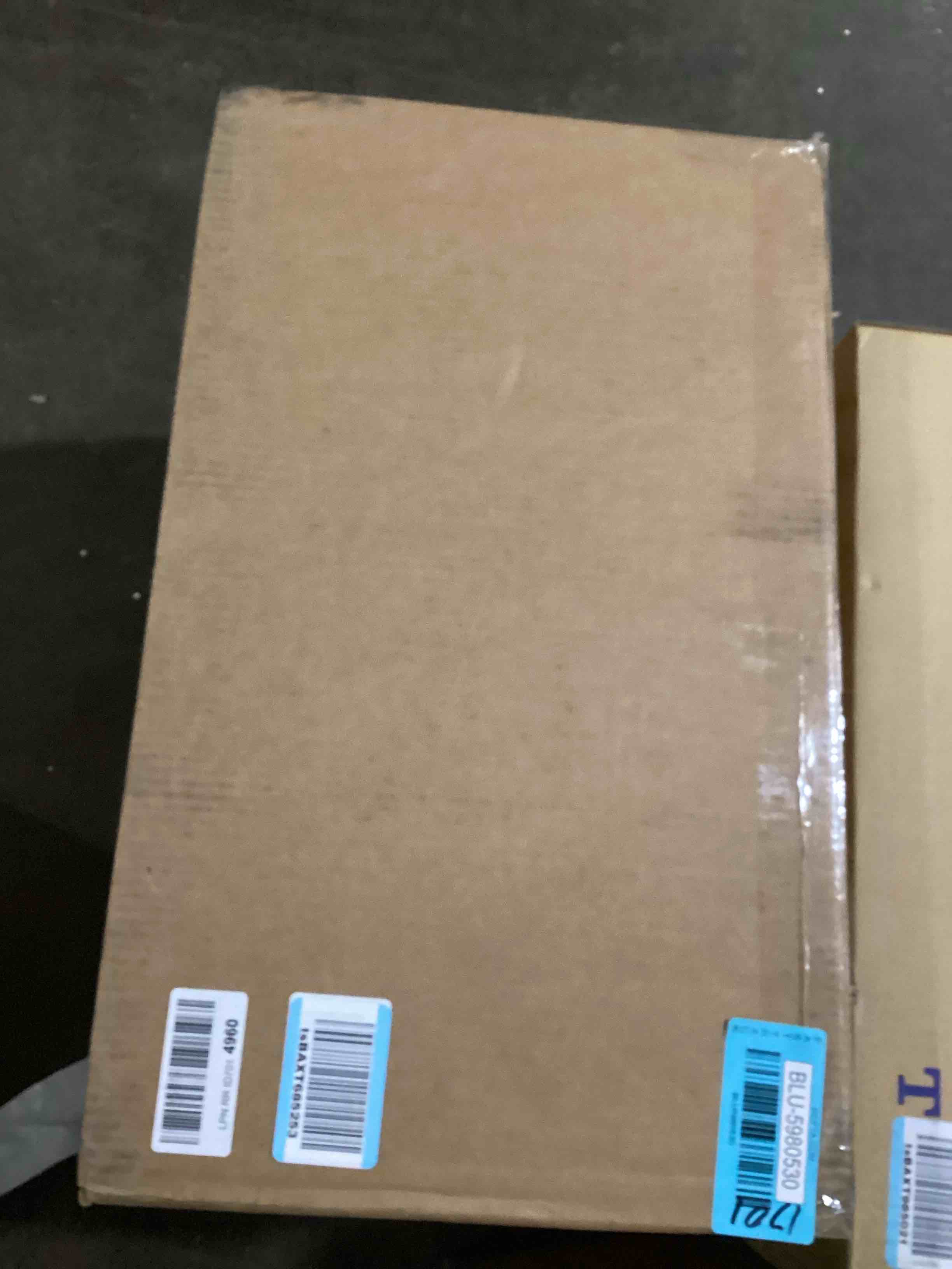 https://s3.amazonaws.com/lotting-images-prod/bidfta/BLU5980530_1709233290252.jpeg