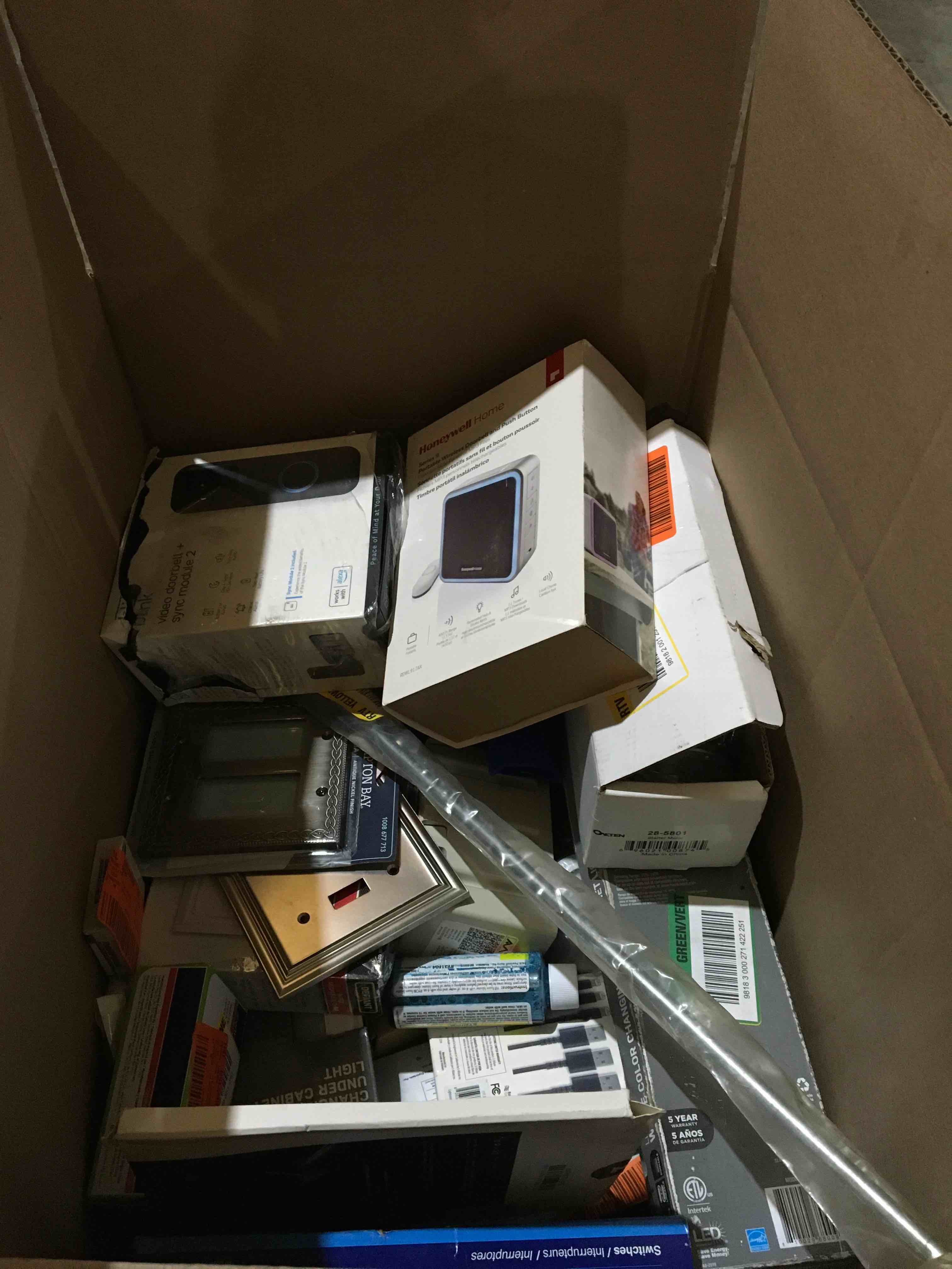 Assortment of miscellaneous doorbells, electrical wall mounts and chargers