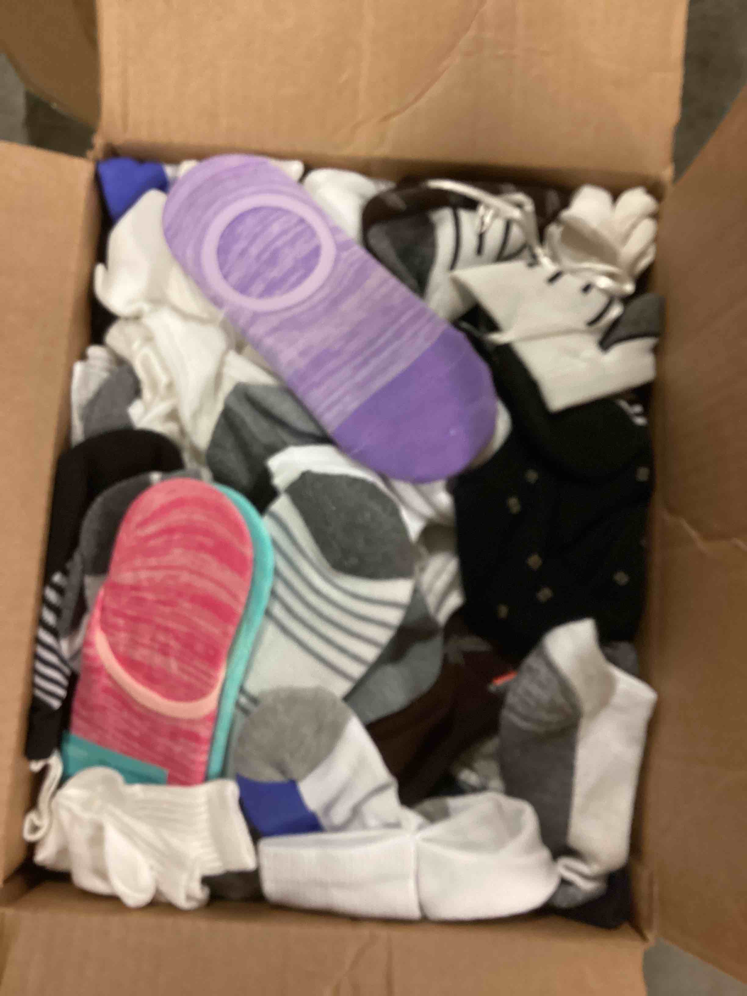 LARGE ASSORTMENT OF SOCKS FOR MEN, WOMEN AND CHILDREN