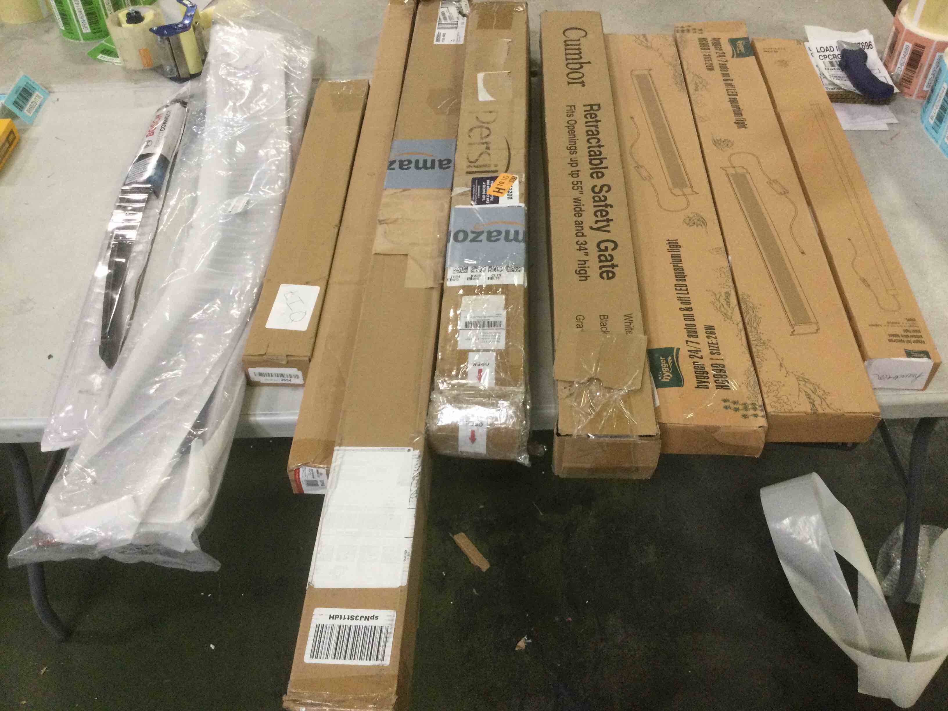 Assortment of Miscellaneous products (May Include cordless shade, curtain rods, retractable baby gate, Led universal linear lamp and more or other use)