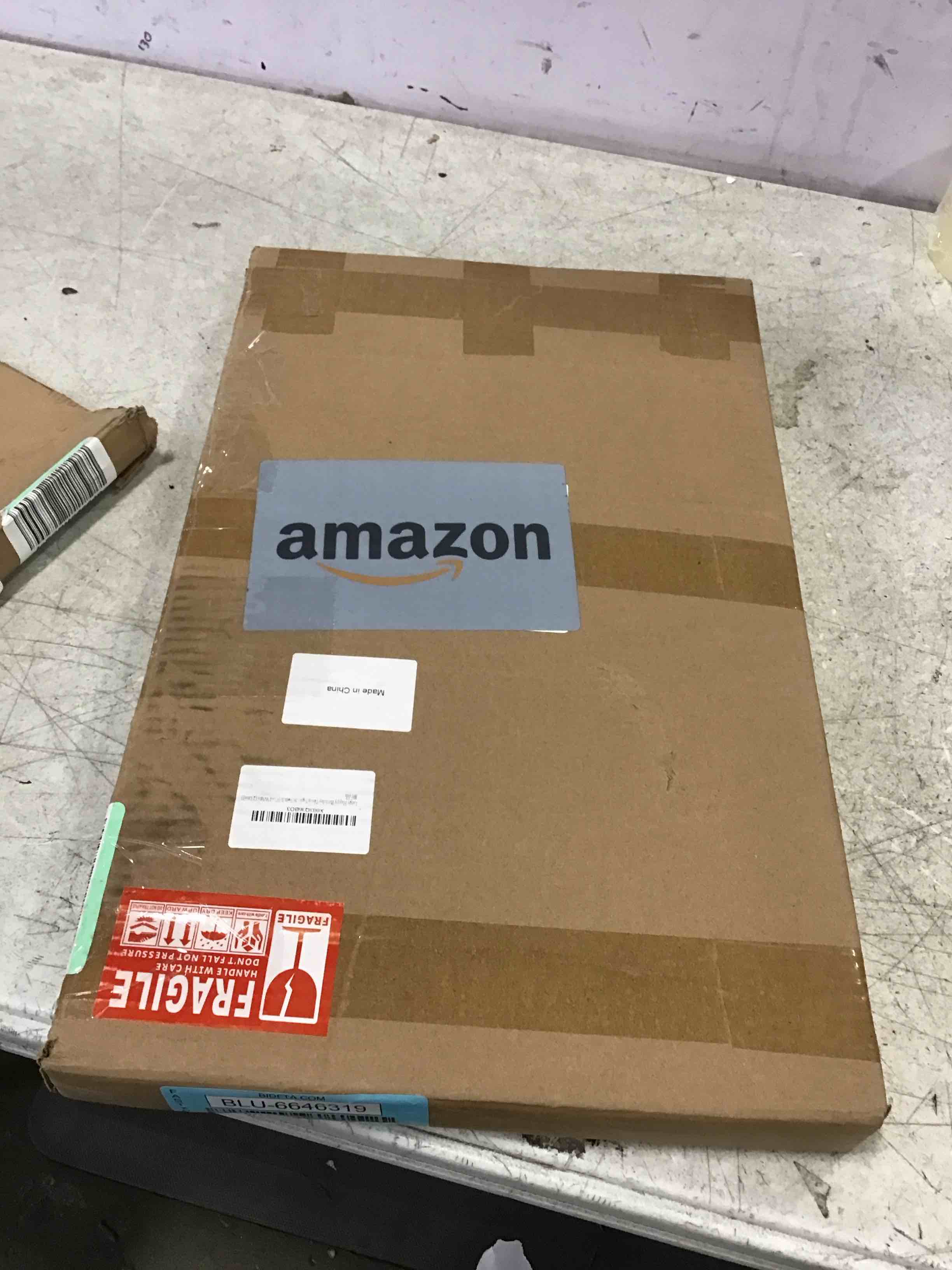 https://s3.amazonaws.com/lotting-images-prod/bidfta/BLU6646319_1720450587389.jpeg