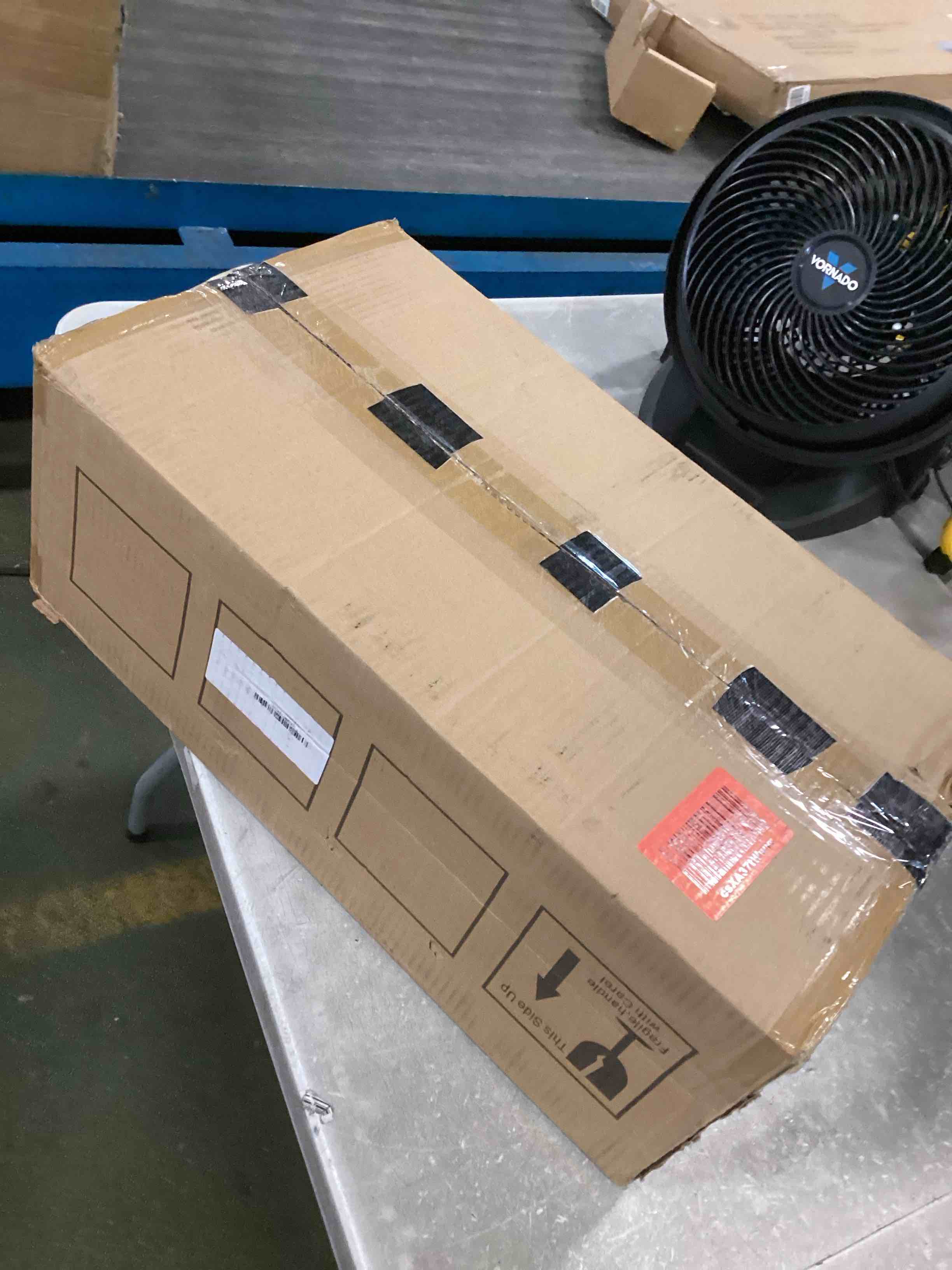 https://s3.amazonaws.com/lotting-images-prod/bidfta/BLU6822863_1720444565129.jpeg