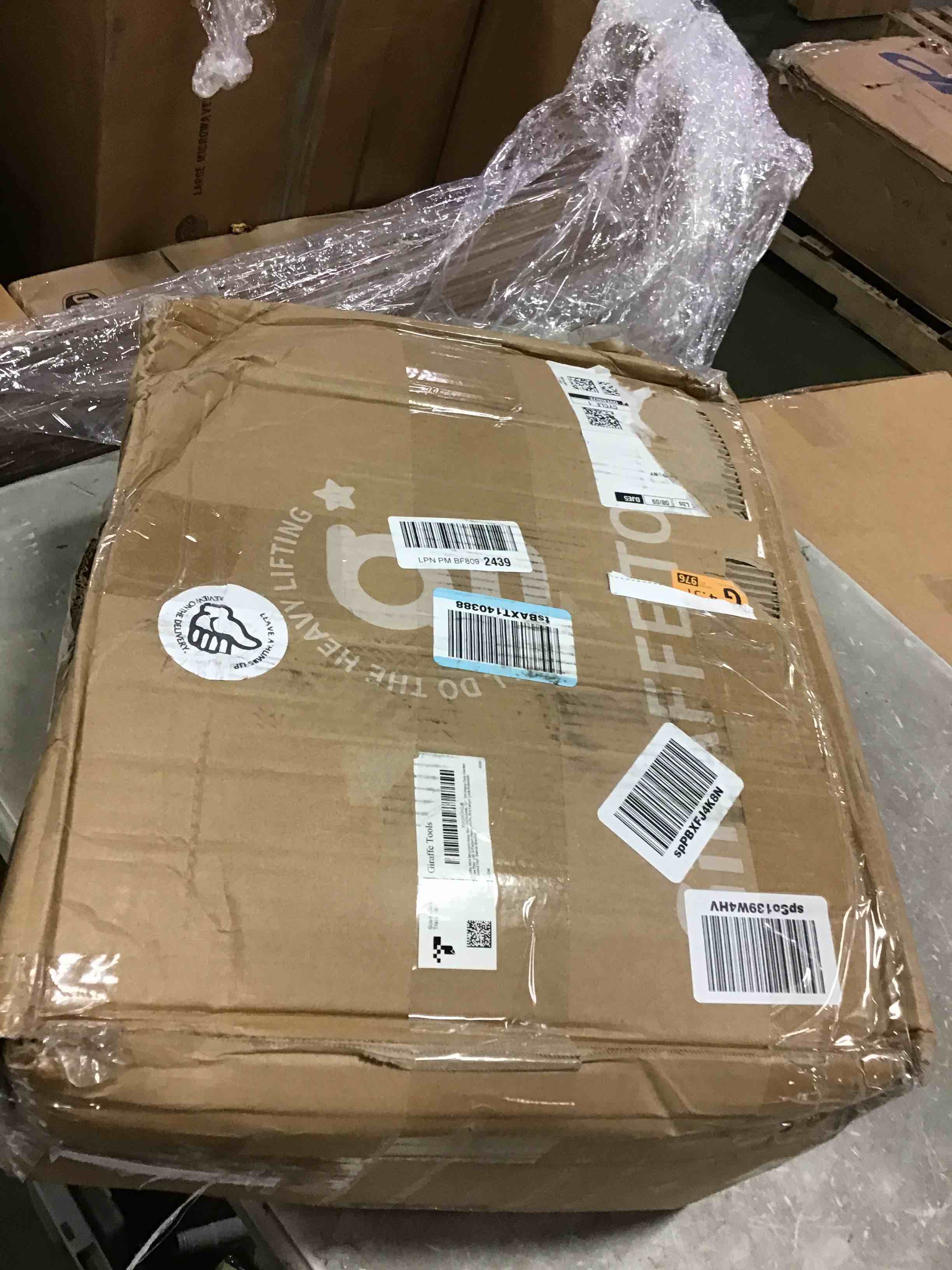 https://s3.amazonaws.com/lotting-images-prod/bidfta/BRN0012230_1725024131855.jpeg
