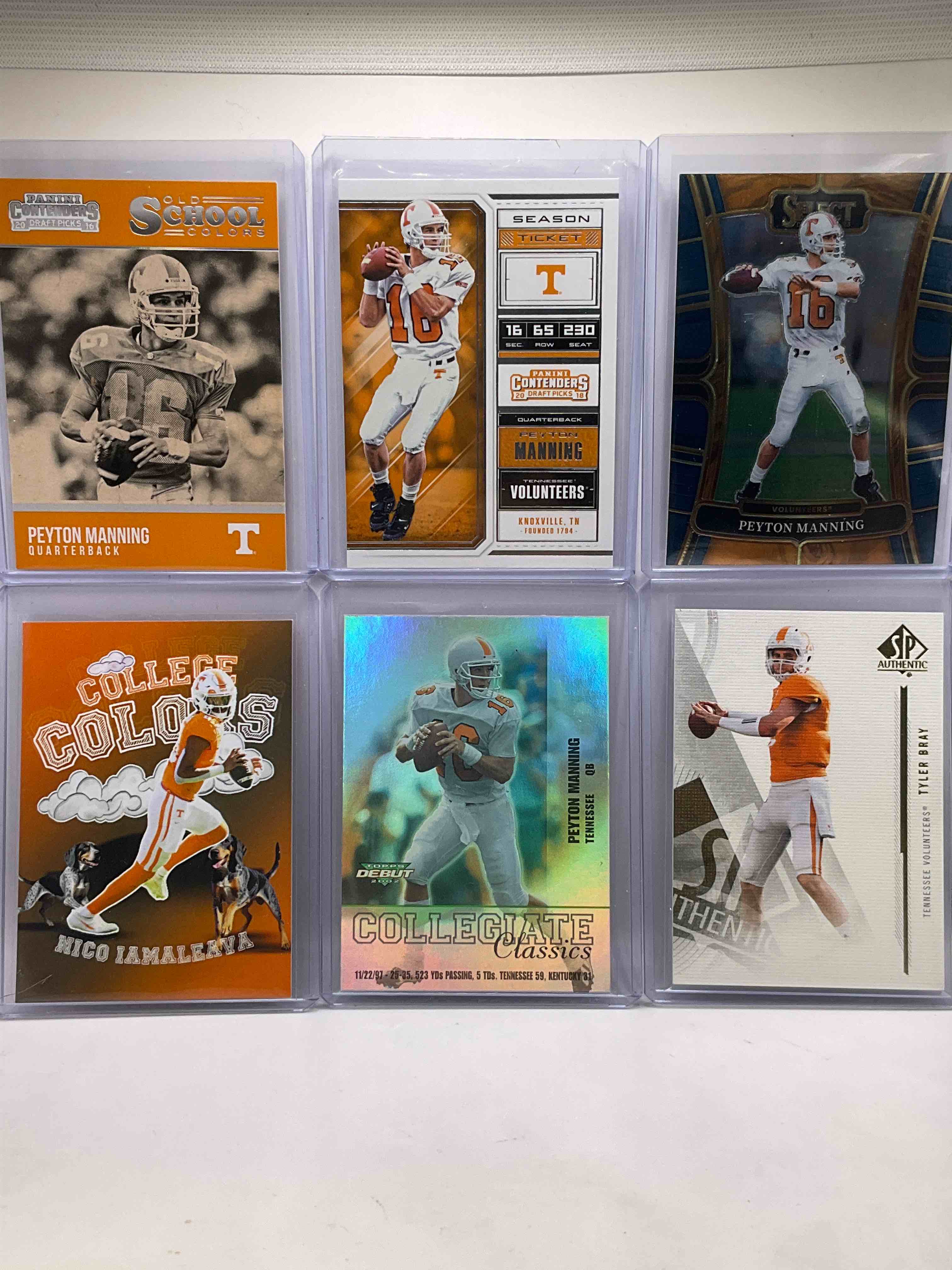 Volunteers Fans Rejoice! Three Awesome Tennessee Volunteers Players! Peyton Manning Old School Colors Card, Season Ticket Card, Topps Debut Collegiate Classics Card, Select Card, Nico Iamaleava College Colors Card & Tyler Bray SP Authentic Card! All Mint!