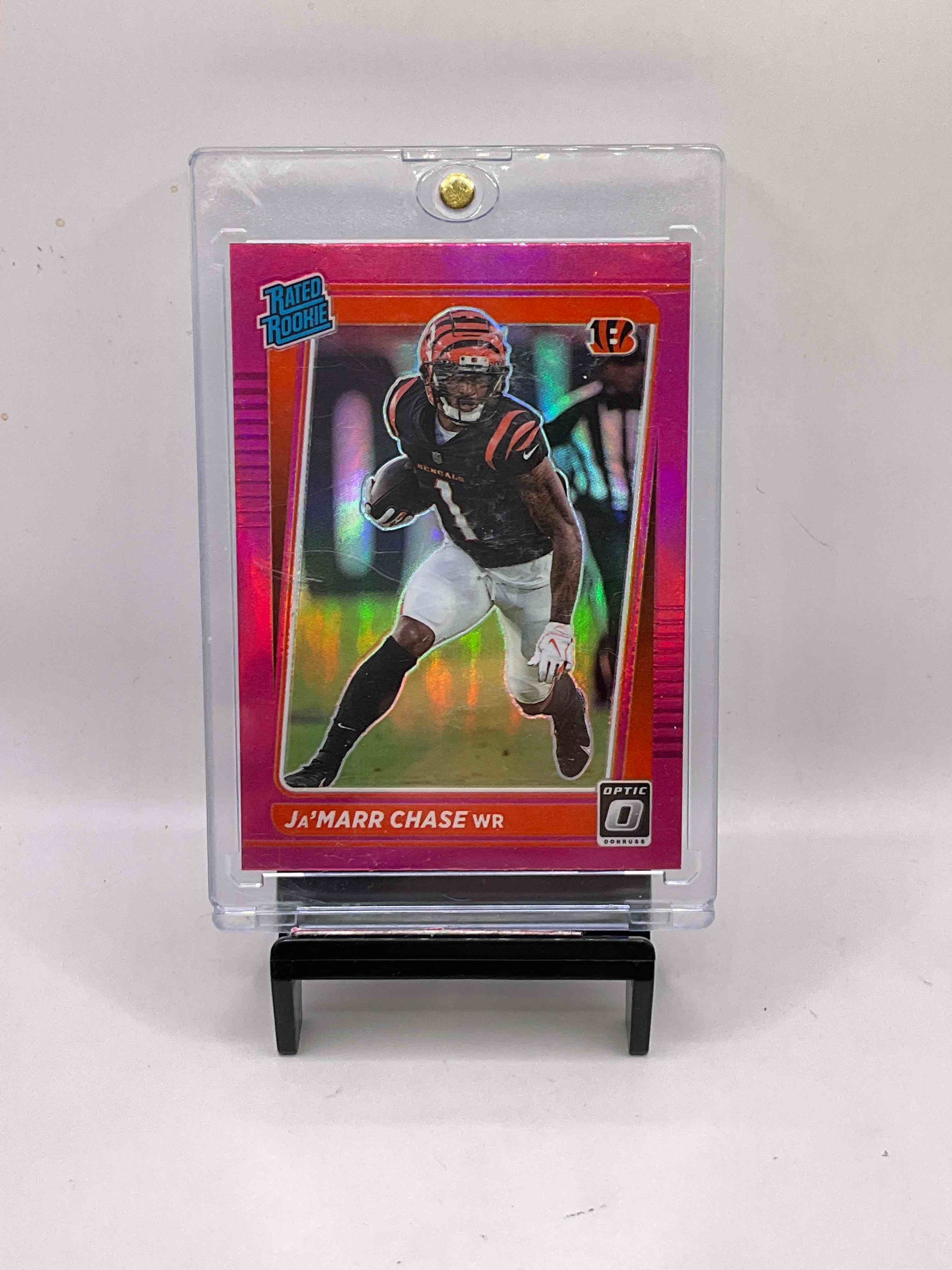 Ja’marr Chase Optic Pink & Orange Rated Rookie Card, In Valuable One Touch Magnetic Case, Paired With A Joe Burrow Rare Out Of This World Series Card! Both Mint, Doesn’t Get Better!