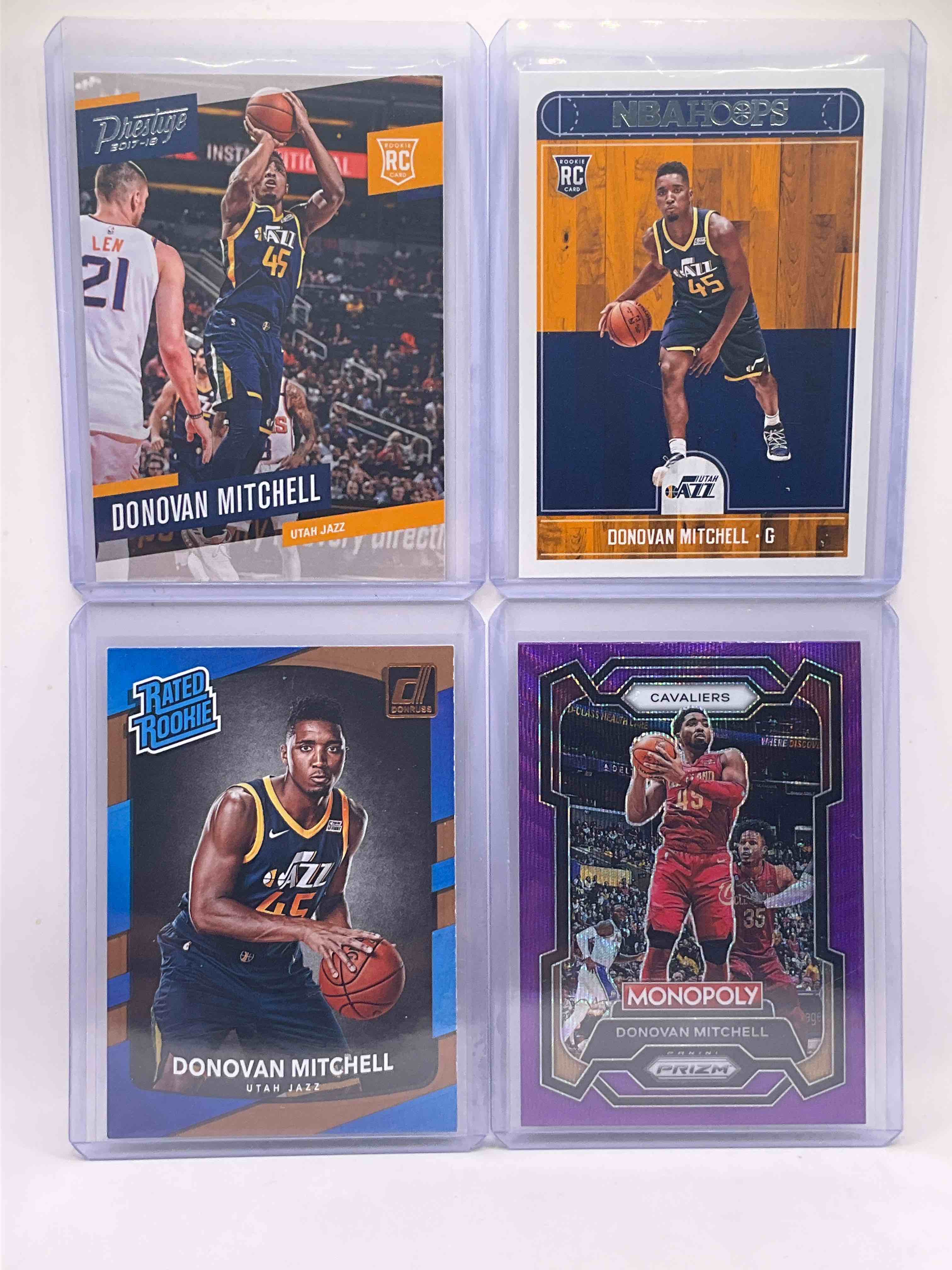 Cavs Legend Already… Donovan Mitchell! Leading The Team To The Best Record In The NBA! Super Rare Donovan Mitchell Prestige, Donruss & NBA Hoops Rookies! Along With Monopoly Purple Card! Super Rare & Mint!