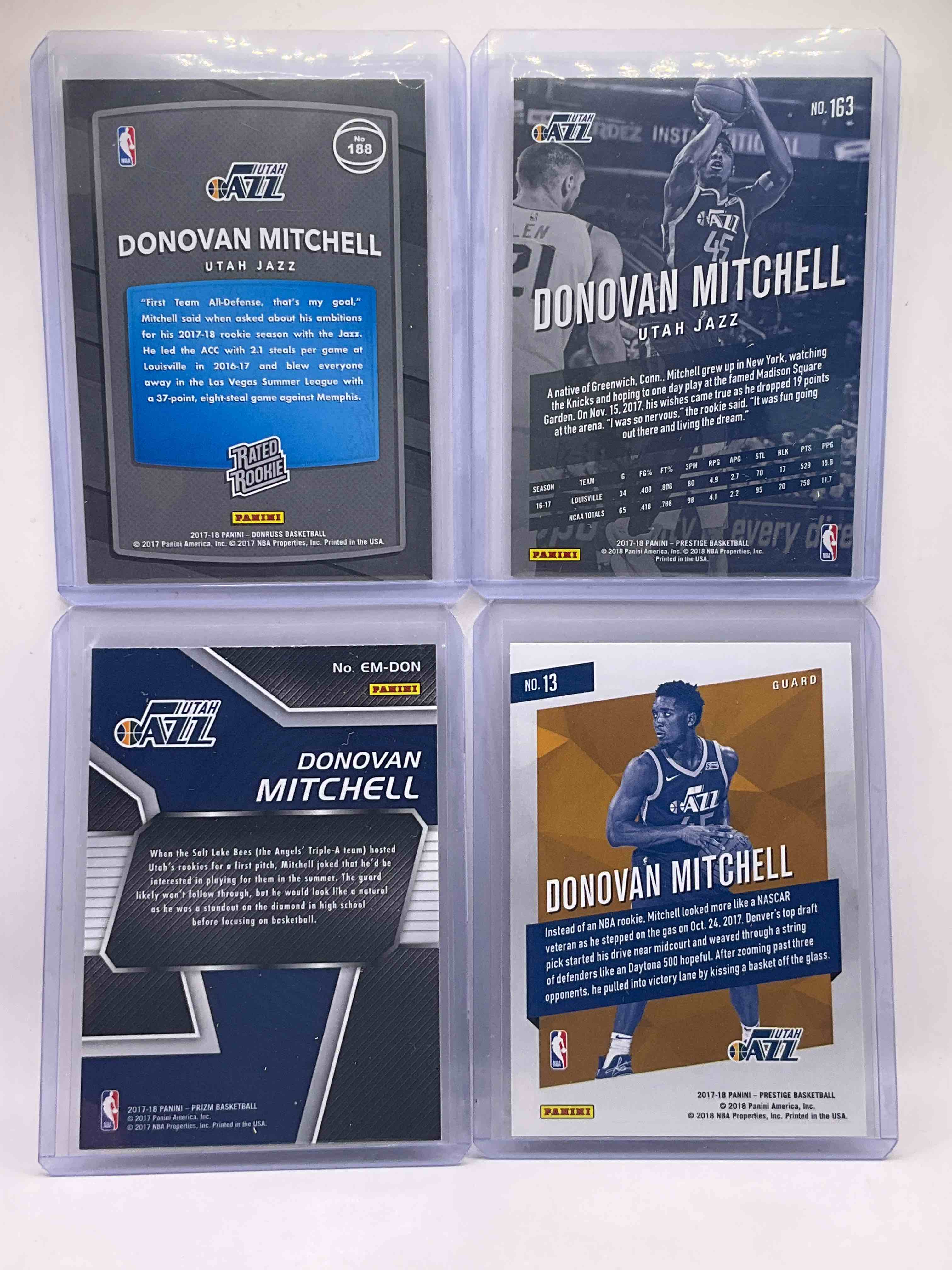 Condition photo showing Good Condition for Louisville Superstar Donovan Mitchell Rookie Cards Galore! One Of The Best NBA Players Now, Leading A Team With The Best Record In NBA… The CAVS! Prizm Rookie Card, Donruss Rookie Card, Prestige Cracked Silver Rookie Card & Prestige Base Rookie! All Mint!