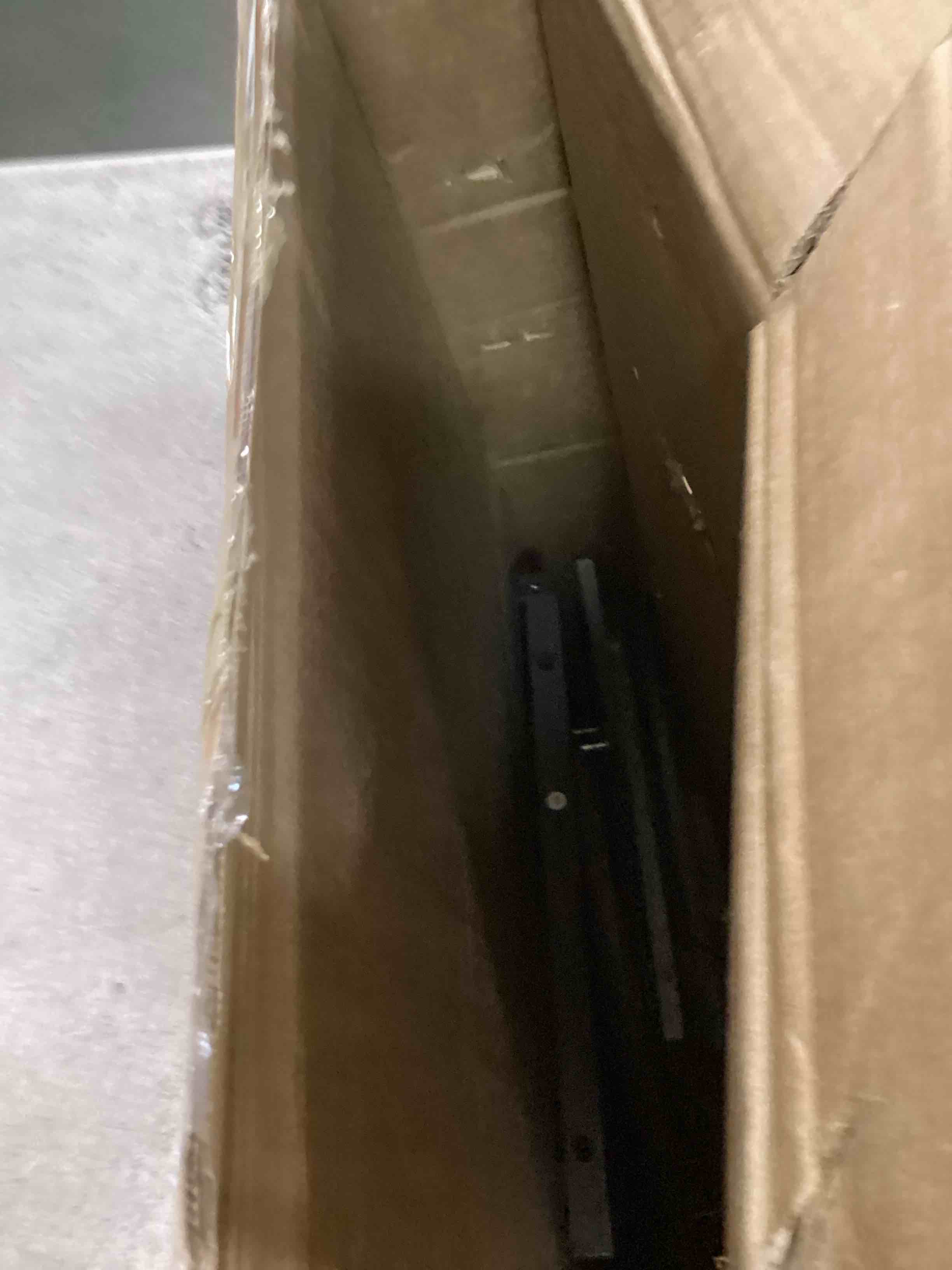 https://s3.amazonaws.com/lotting-images-prod/bidfta/BRN0064446_1725102499277.jpeg