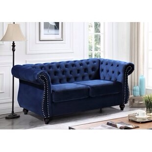Similar to photon navy blue upholstered loveseat 