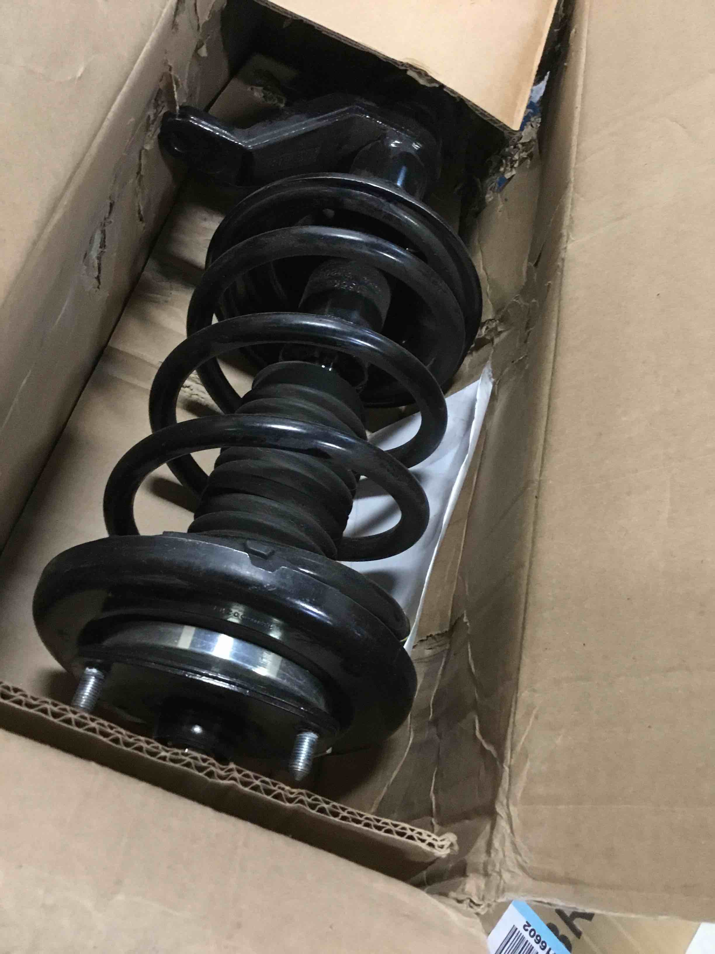 Condition photo showing As Is for Monroe Quick-Strut 172135 Suspension Strut and Coil Spring Assembly for Honda Element