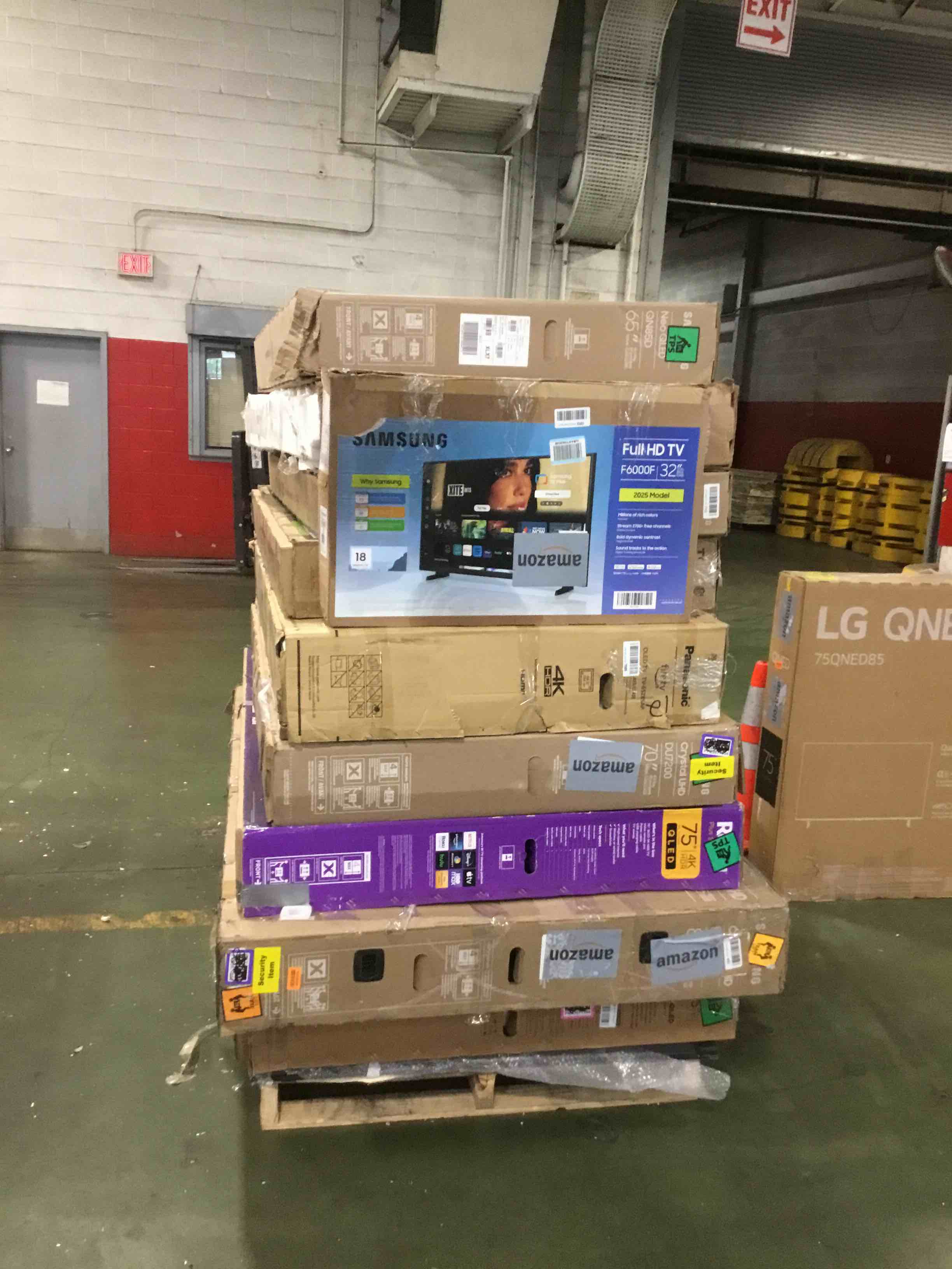 pallet of defective electronics for parts