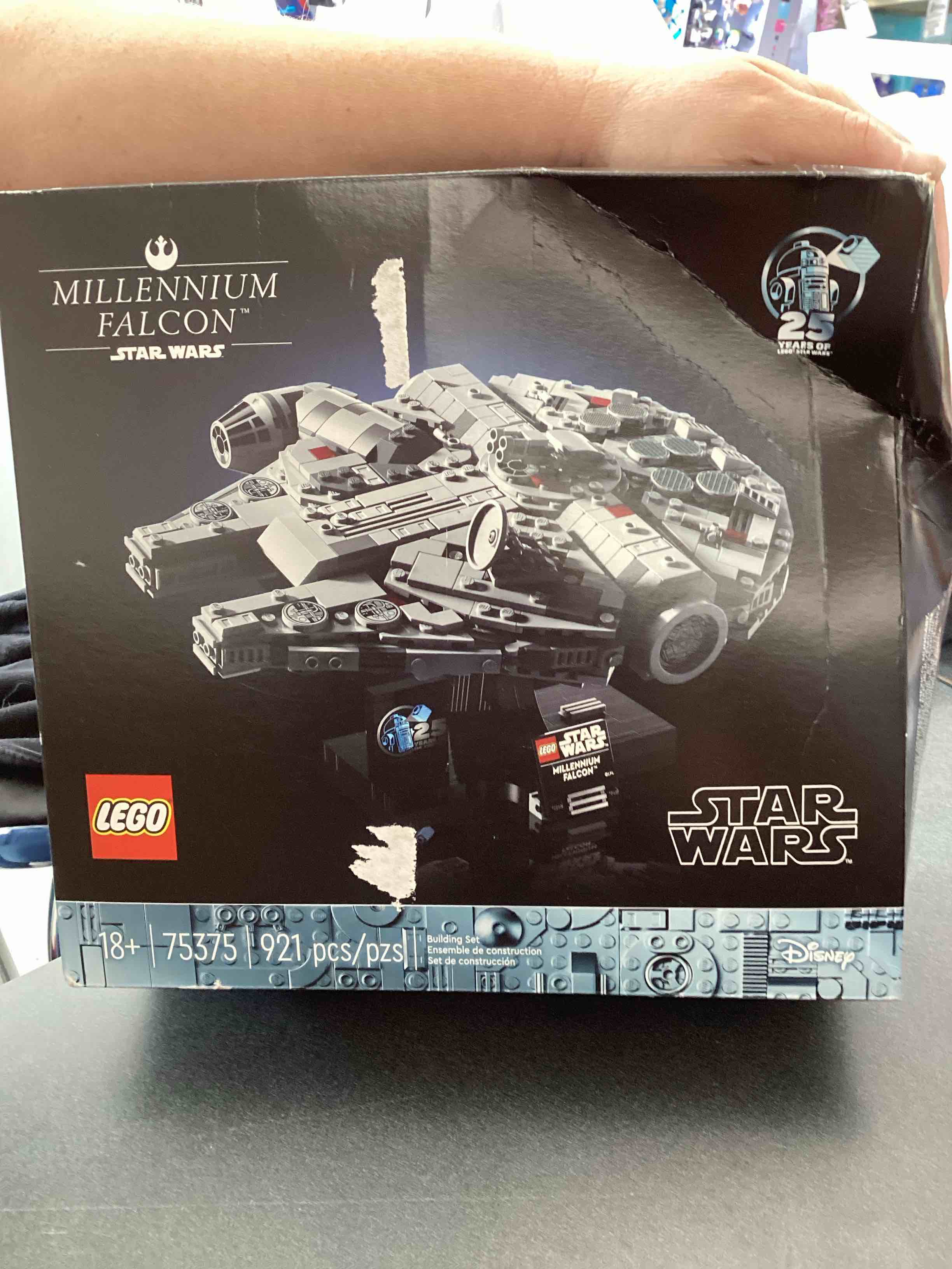 Condition photo showing New/Like New for LEGO Star Wars Millennium Falcon A New Hope 25th Anniversary Collectable Model - DIY Building Sets for Adults, Men & Women, Ages 18+ - Comes with Display Stand - Star Wars Gift - 75375