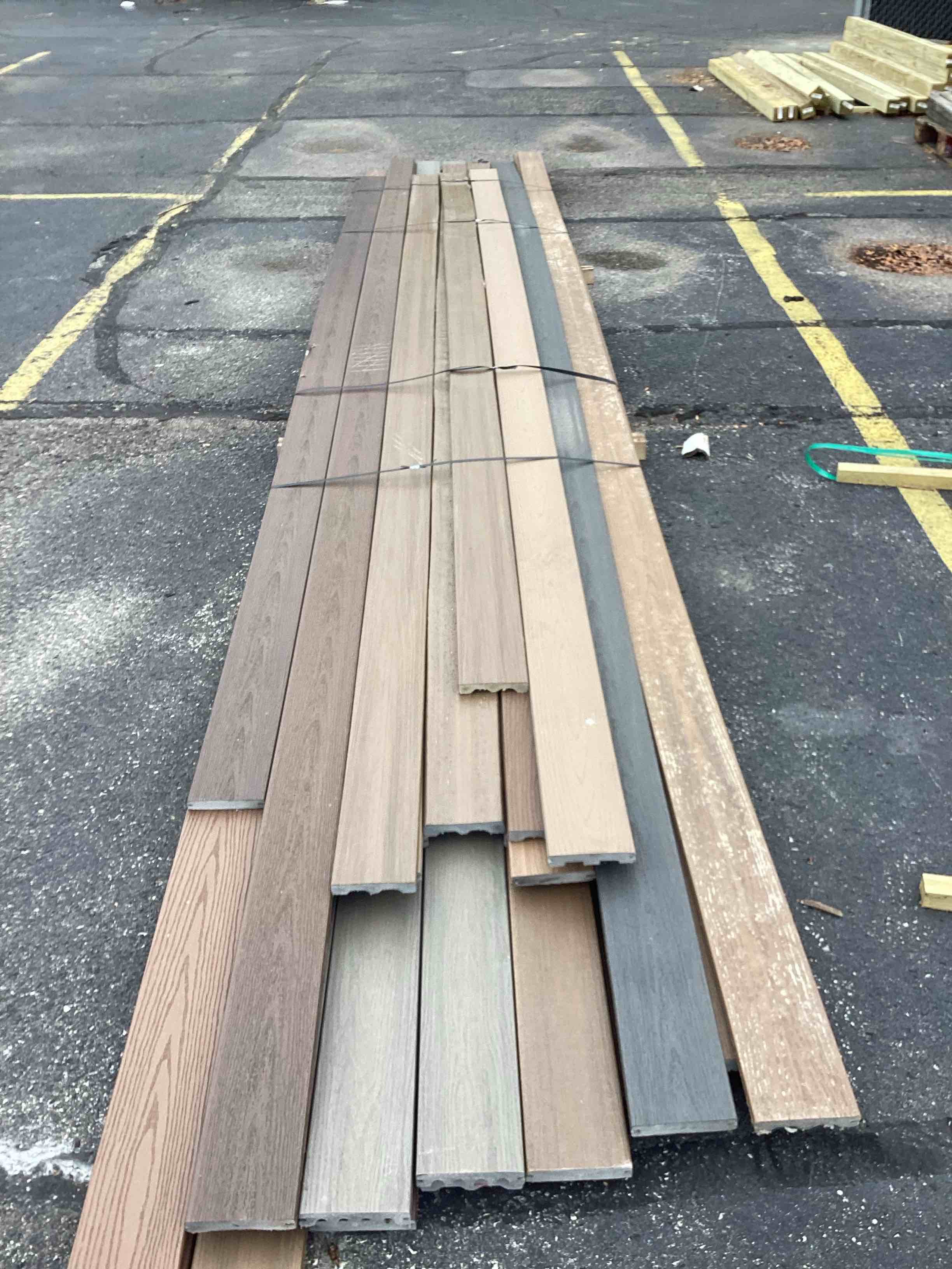 lo of brown composite deck boards various shades 12-20 ft length 35 pieces