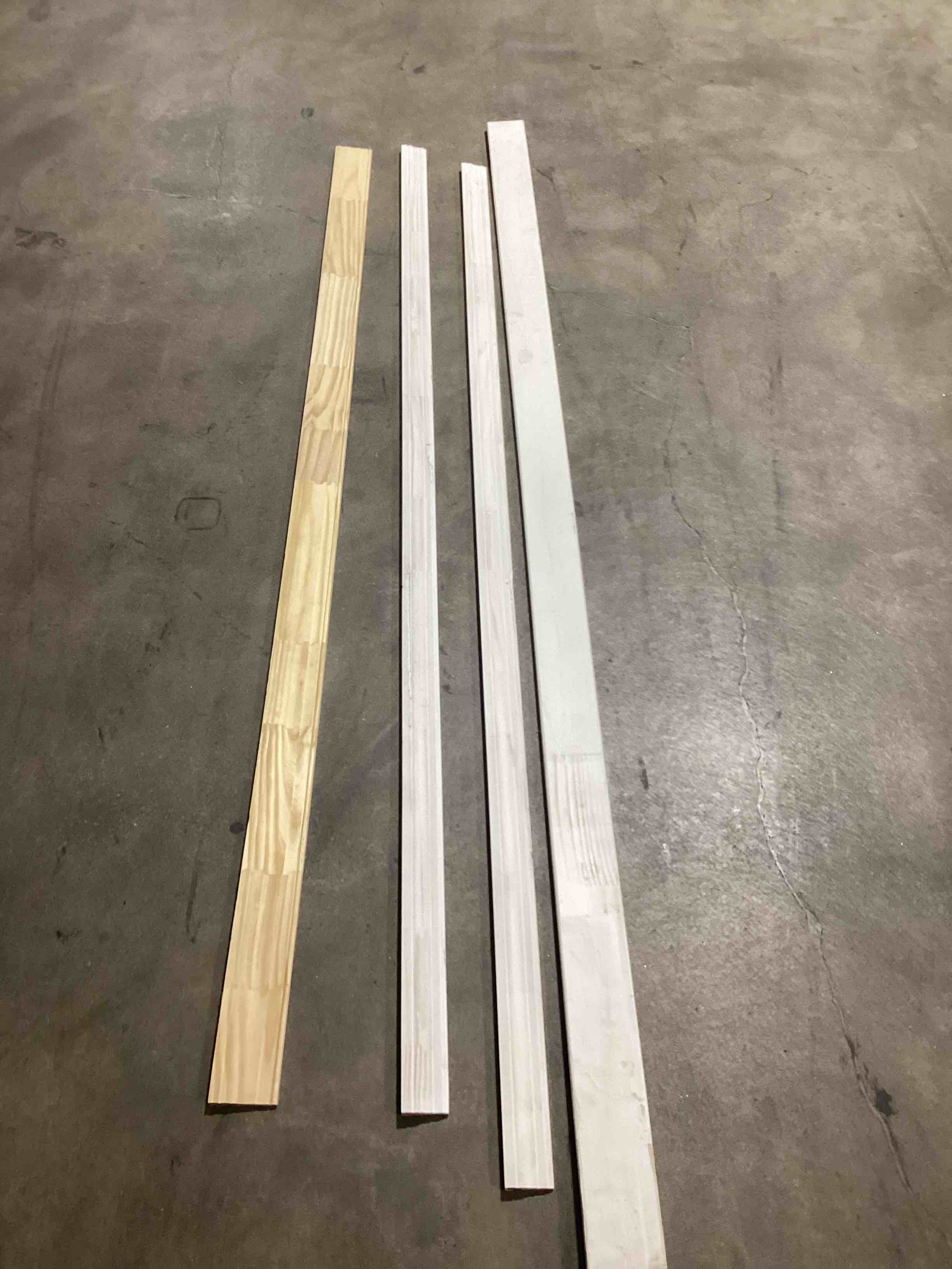 assorted solid wood trim and casing 7 and 8’ lengths various styles and widths—buyers choice