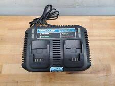 Hercules 12V Lithium-Ion dual-port charger with USB. Helpful information: It charges two batteries simultaneously. It has integrated mounting holes for permanent installation. It is built to withstand job site conditions. It is compatible with all Hercules 20V and 12V lithium-ion batteries. LED indicators show charging status. It prevents overcharging and charging damaged batteries. It can charge a 2.0 Ah 12V battery in 30 minutes. It is fan-cooled to prevent overheating.