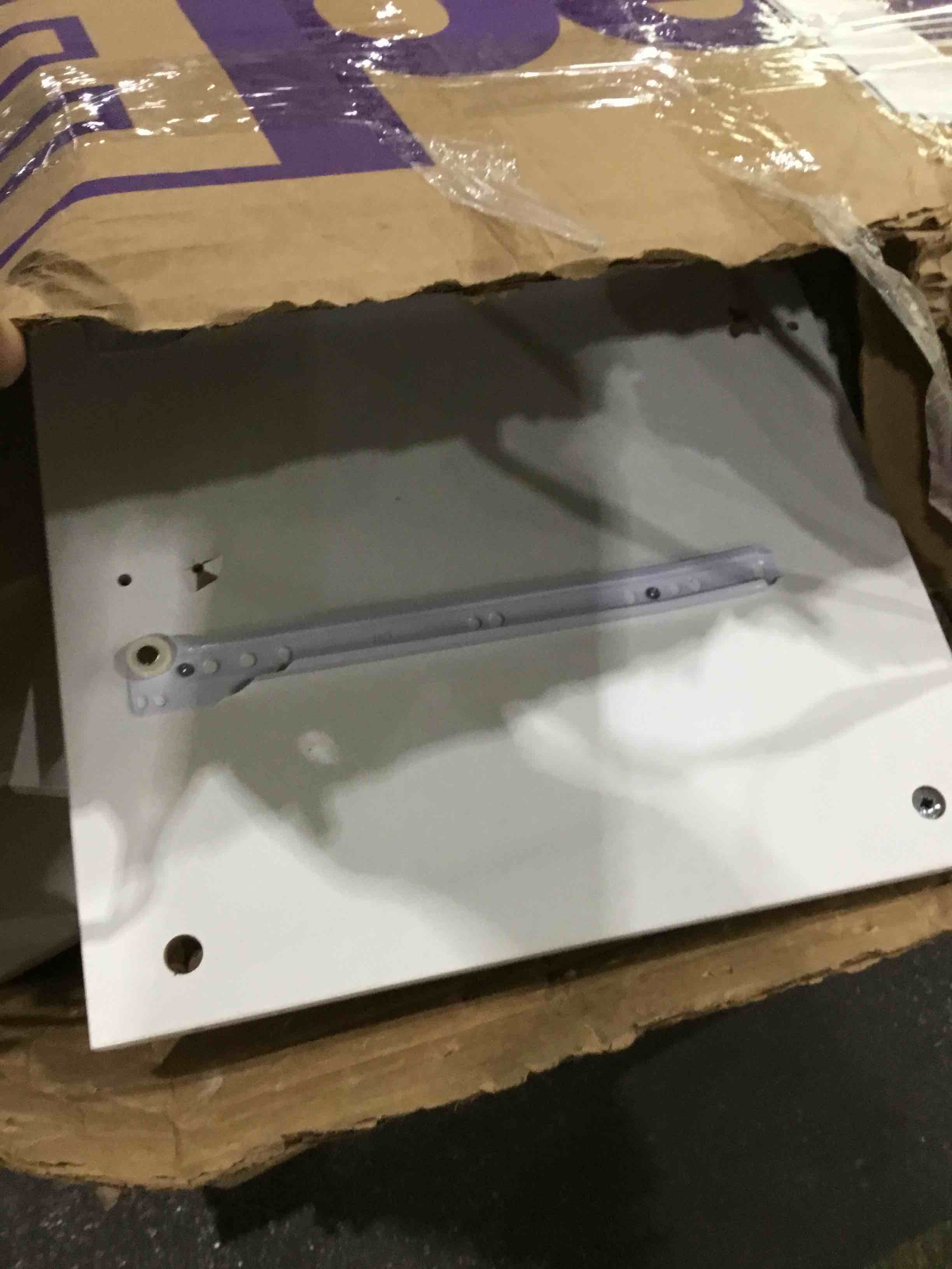 No paperwork to identify product - looks like a white dresser with gold hardware