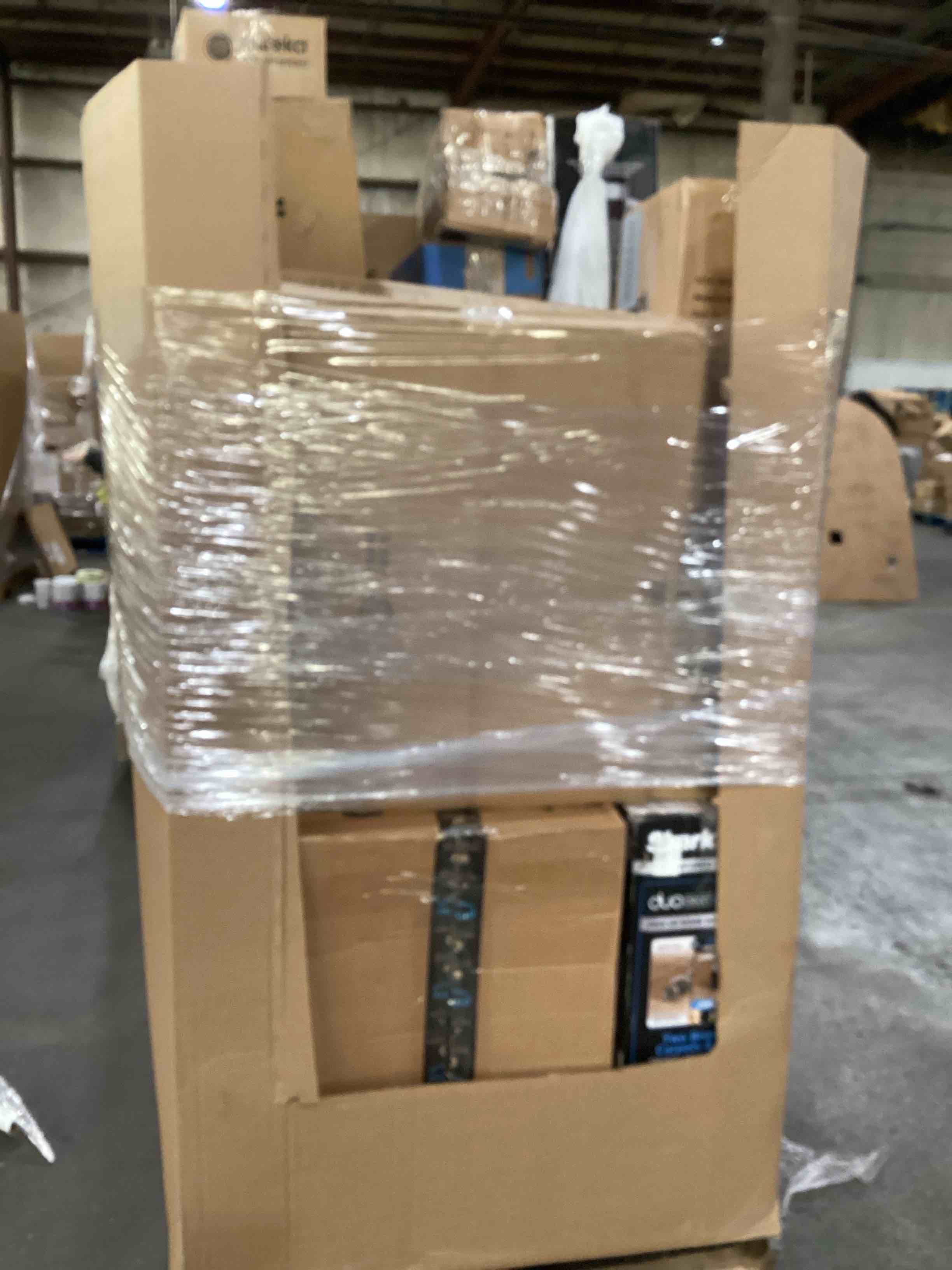 Condition photo showing As Is for pallet of damaged miscellaneous small appliances and parts 