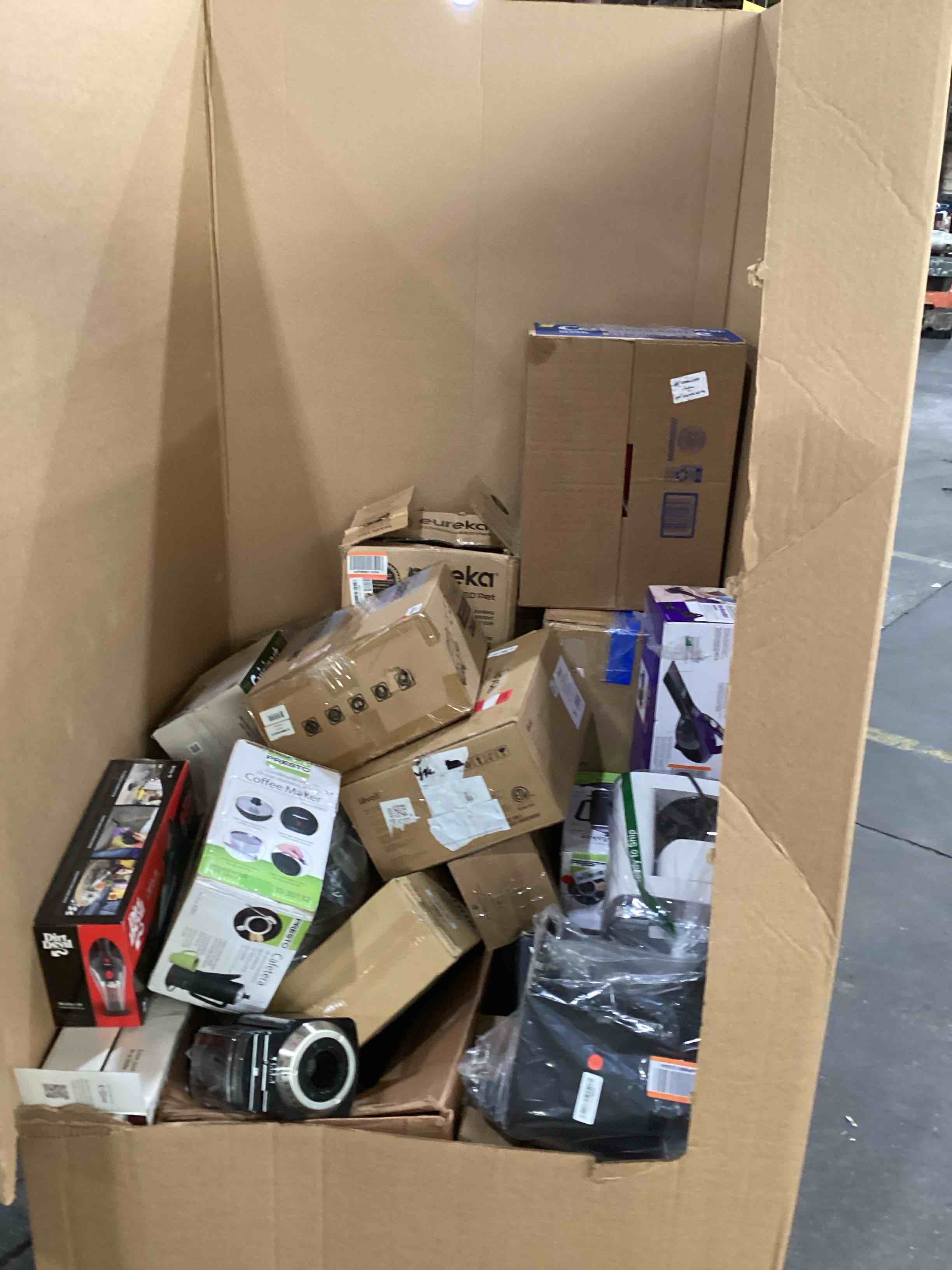 pallet of damaged miscellaneous appliances and parts