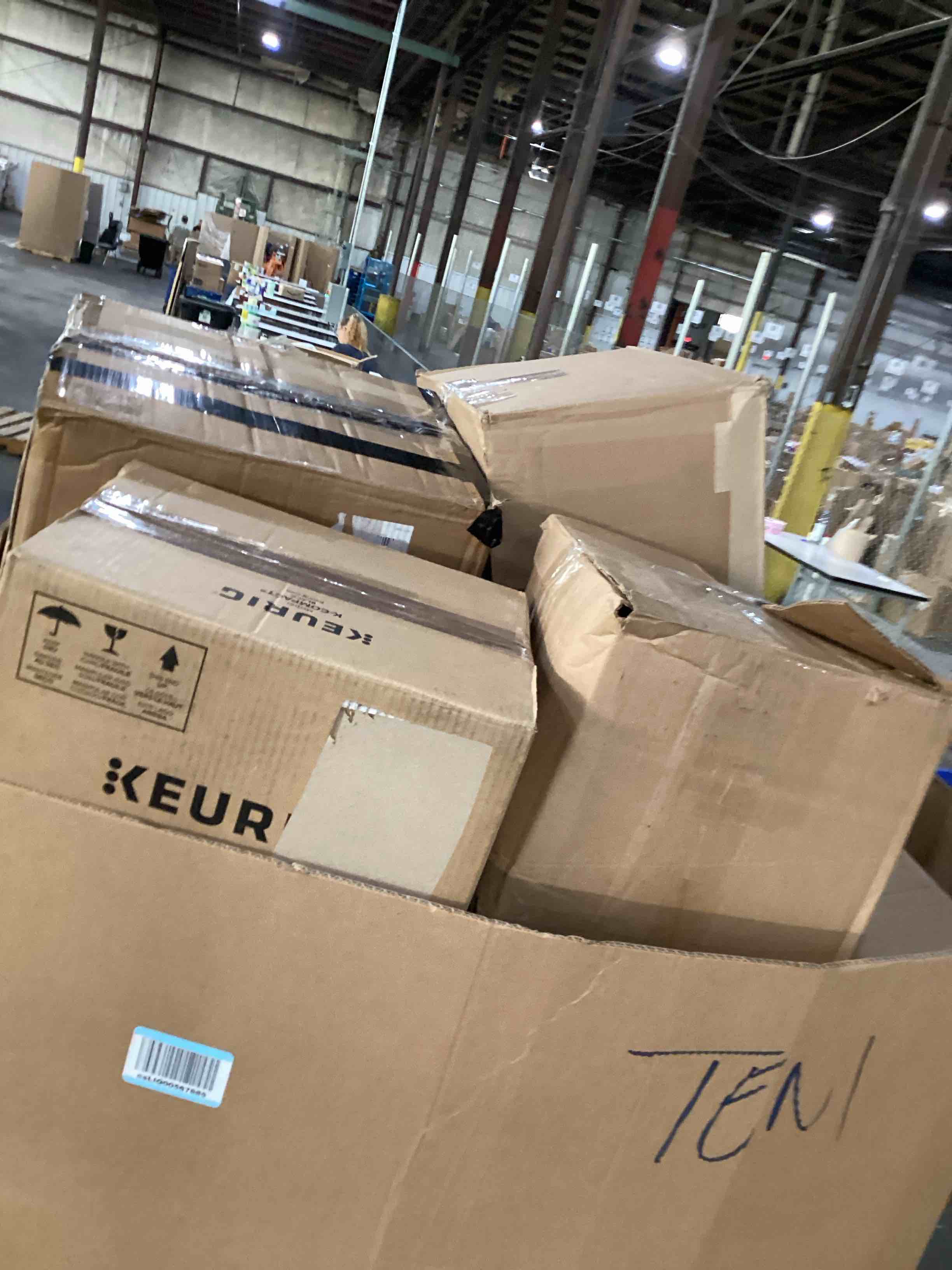 Condition photo showing As Is for pallet of damaged miscellaneous appliances and parts 