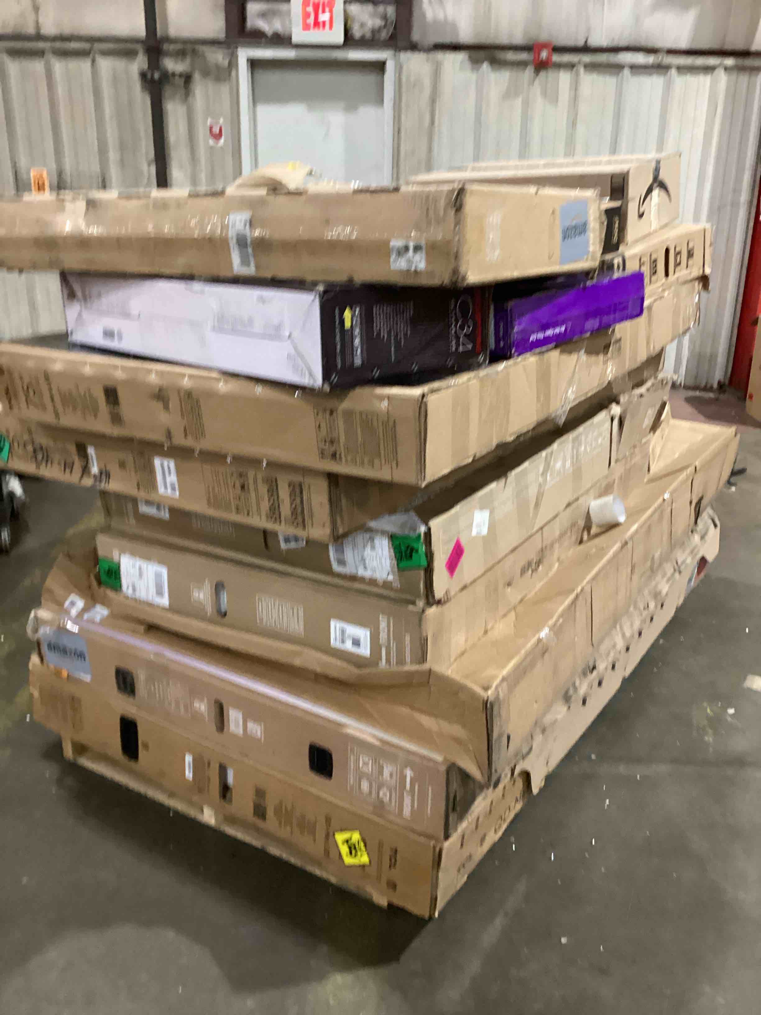 Condition photo showing As Is for pallet of broken tvs and monitors 