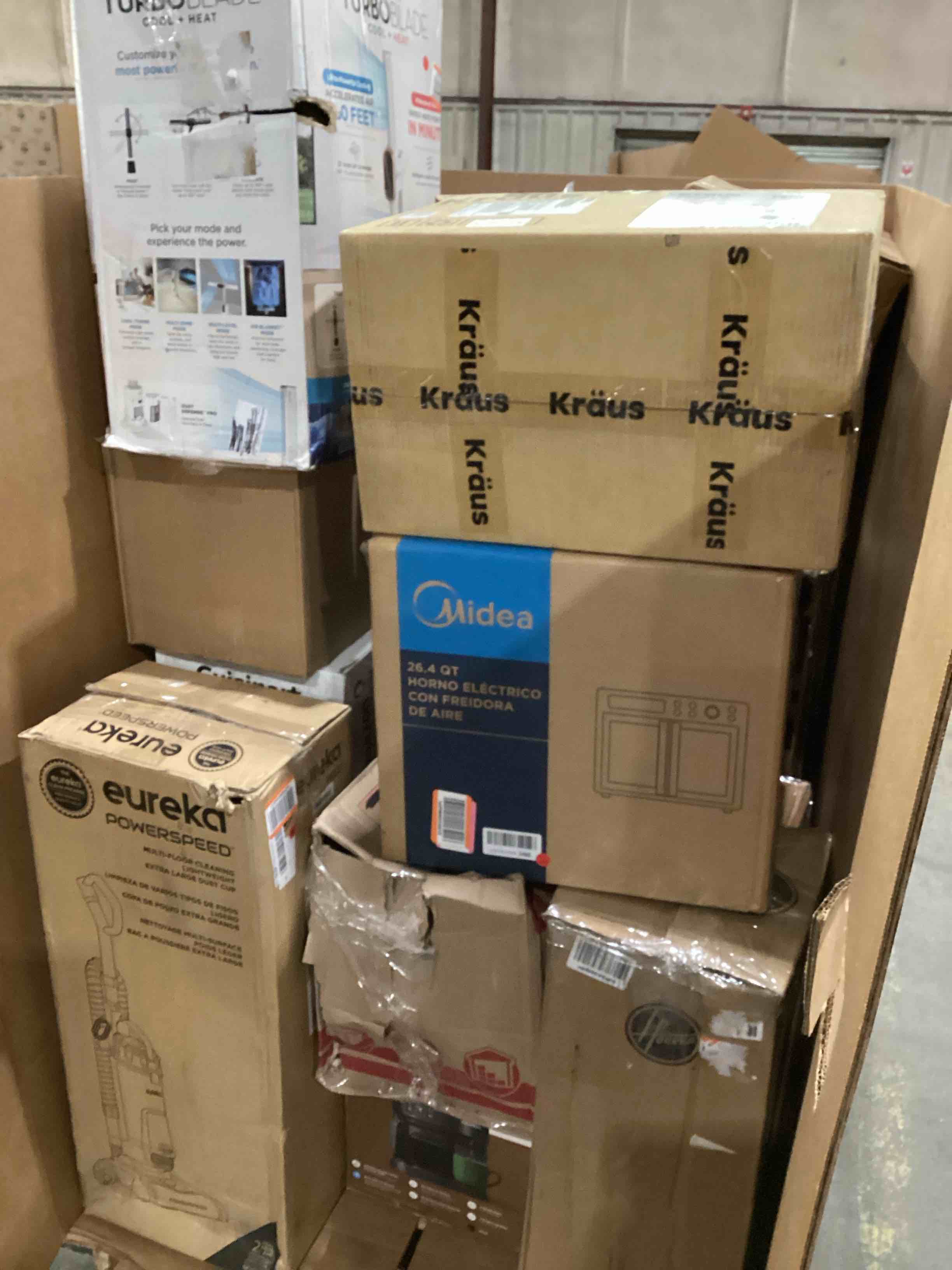 pallet of damaged miscellaneous appliances and parts