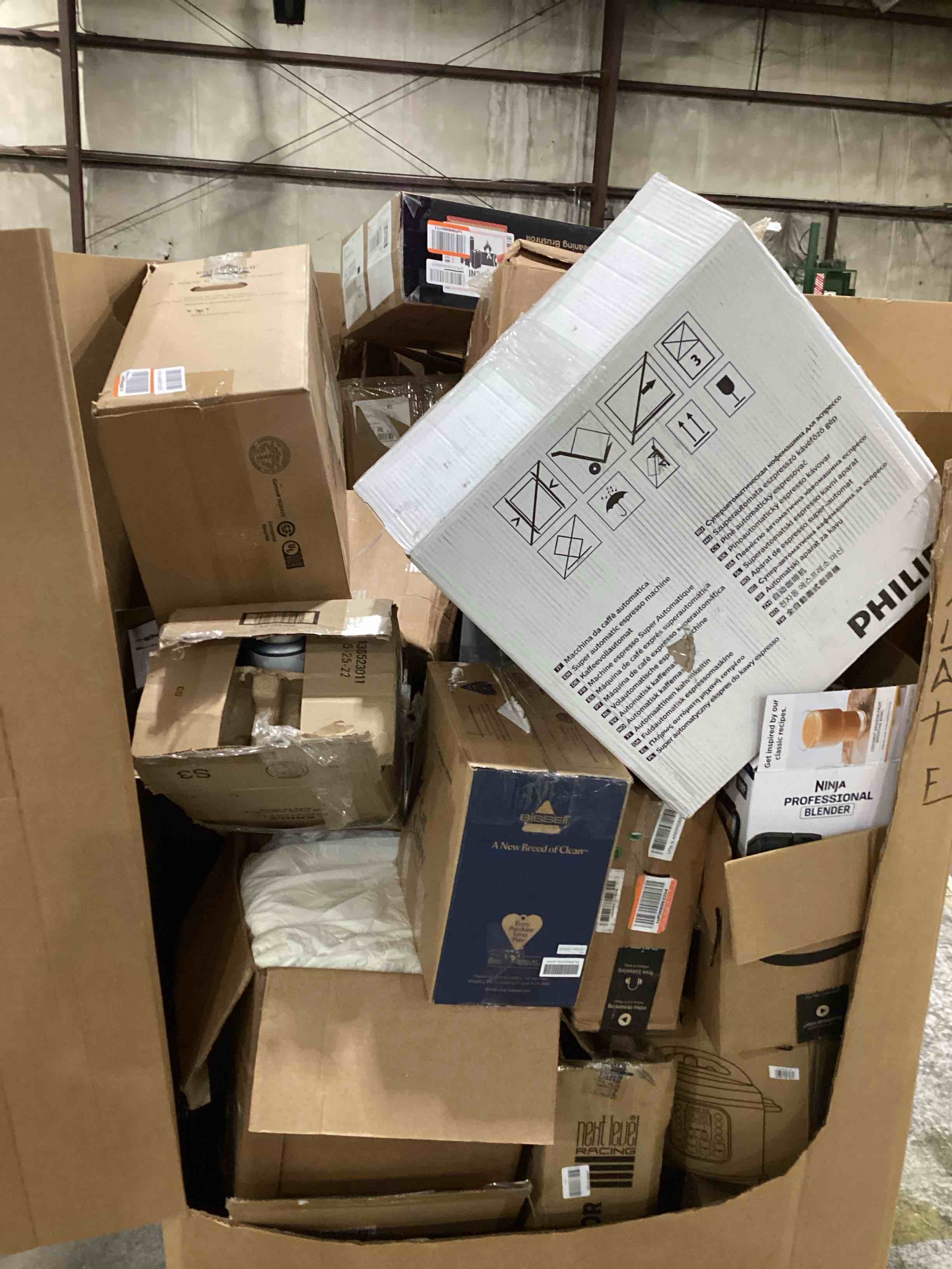 pallet of miscellaneous appliances damaged or missing parts