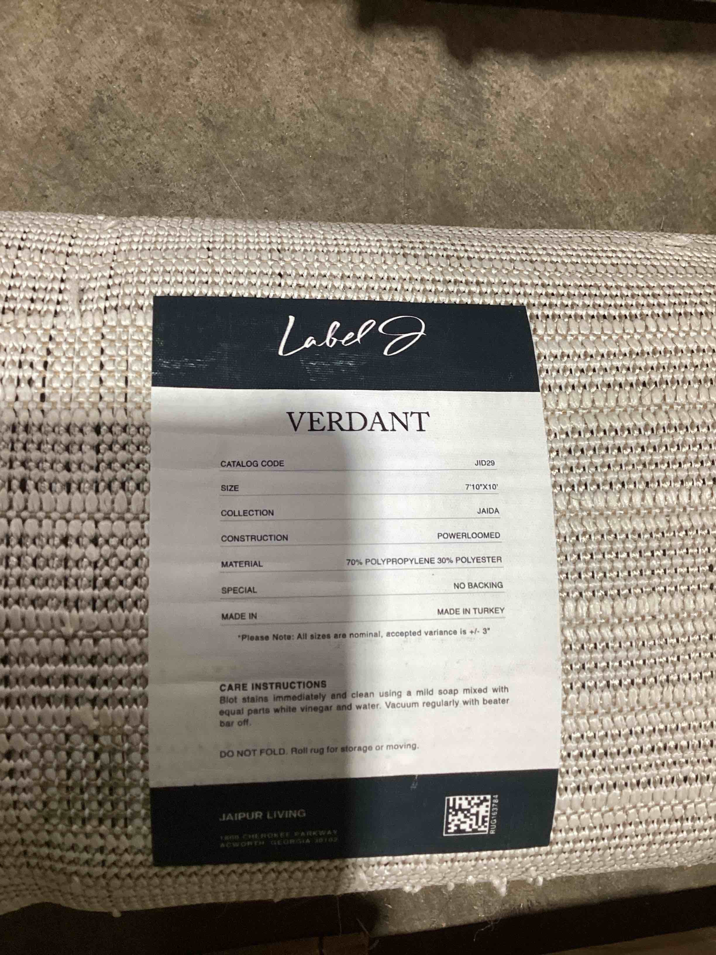 Condition photo showing Good Condition for Jaipur Living Label J Verdant JID29 Geometric Ivory and Green Area Rug (7'10"X10')