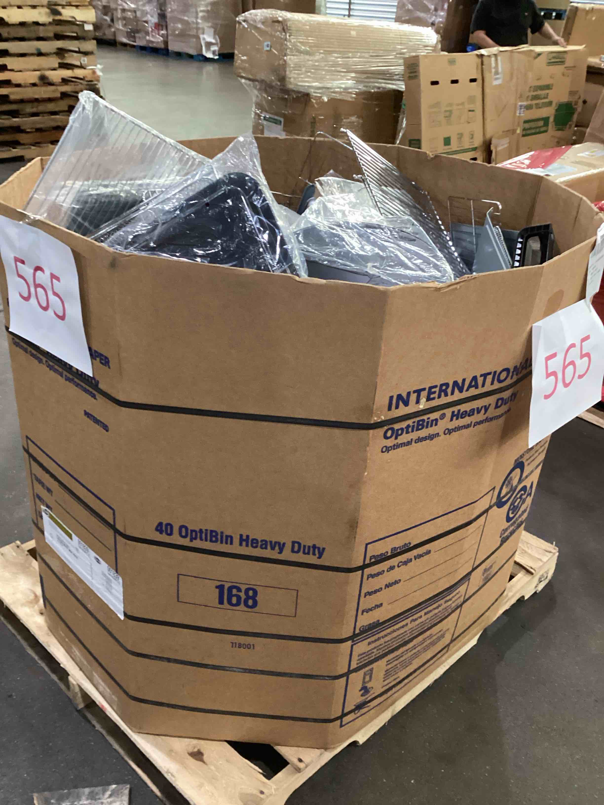 pallet of damaged small appliances and parts