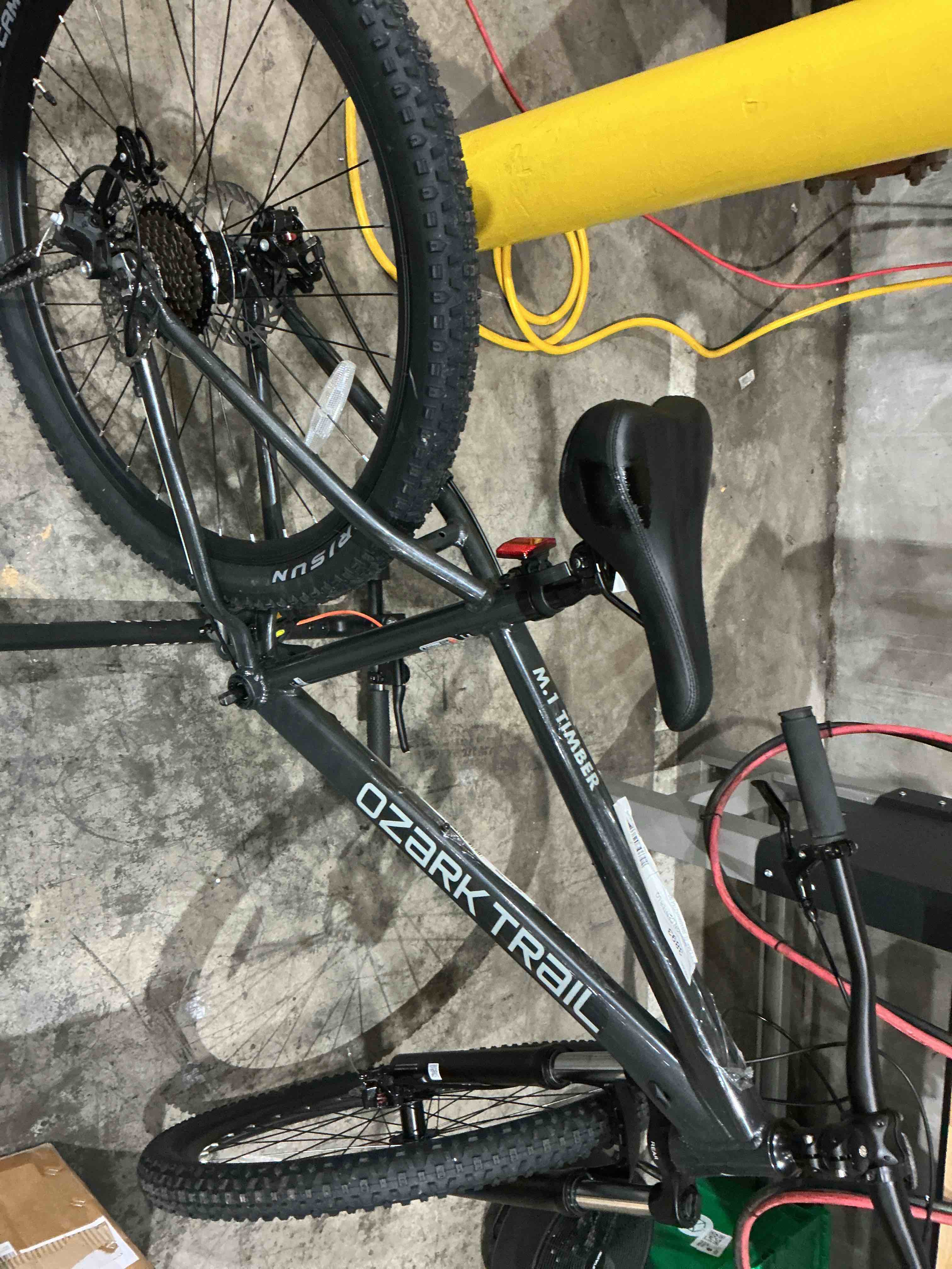 Condition photo showing As Is for ozark trail timber mountain bike, 27.5 in wheels, medium 17 in frame, fits riders 5 ft 3 in-5 ft 8 in, black, unisex