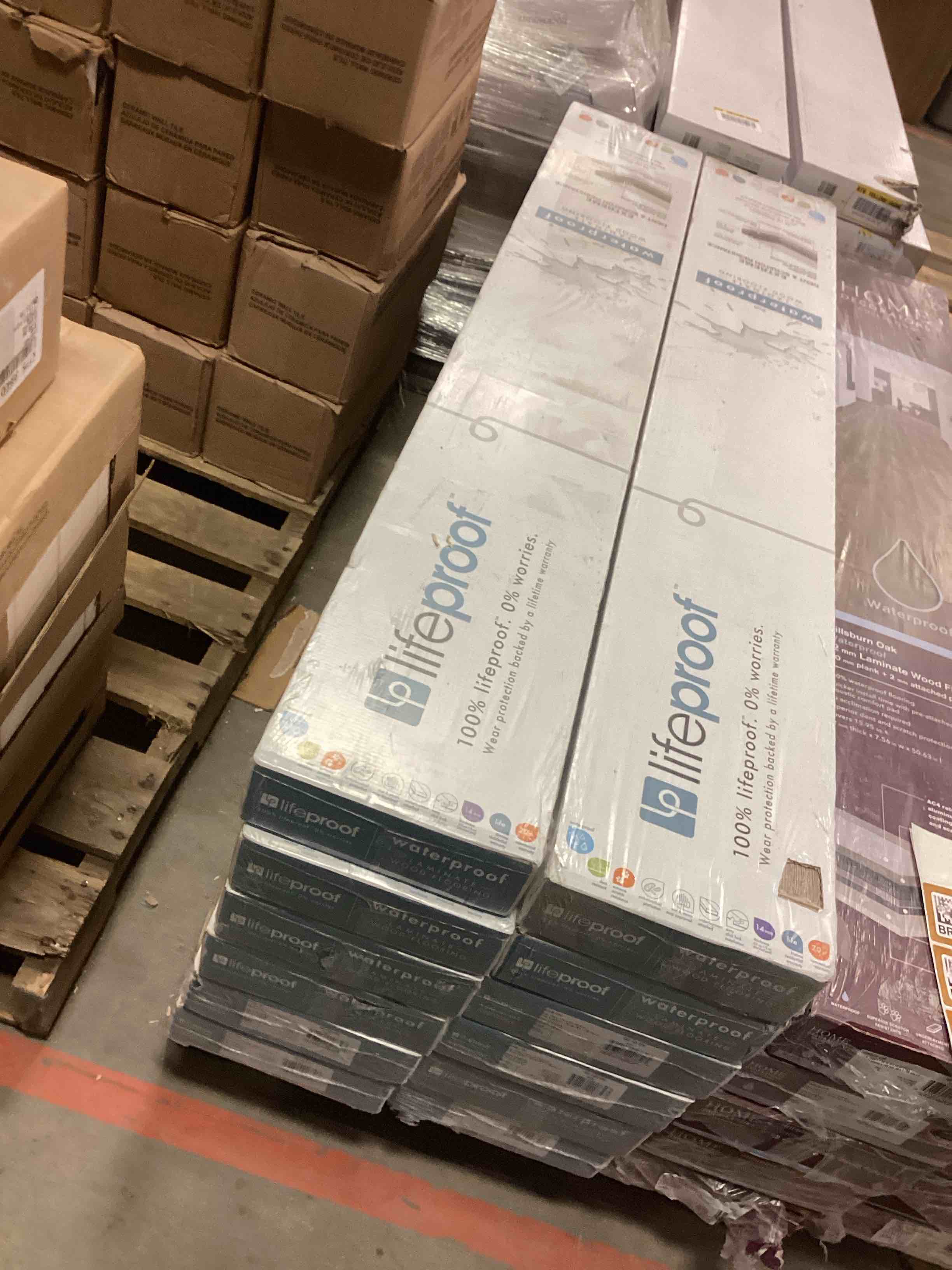 Life proof, waterproof laminated with flooring 14 mm (13.29 sq.ft per box ) 12 Boxes for pick up 159.48 Sq.ft you bid for a square foot
