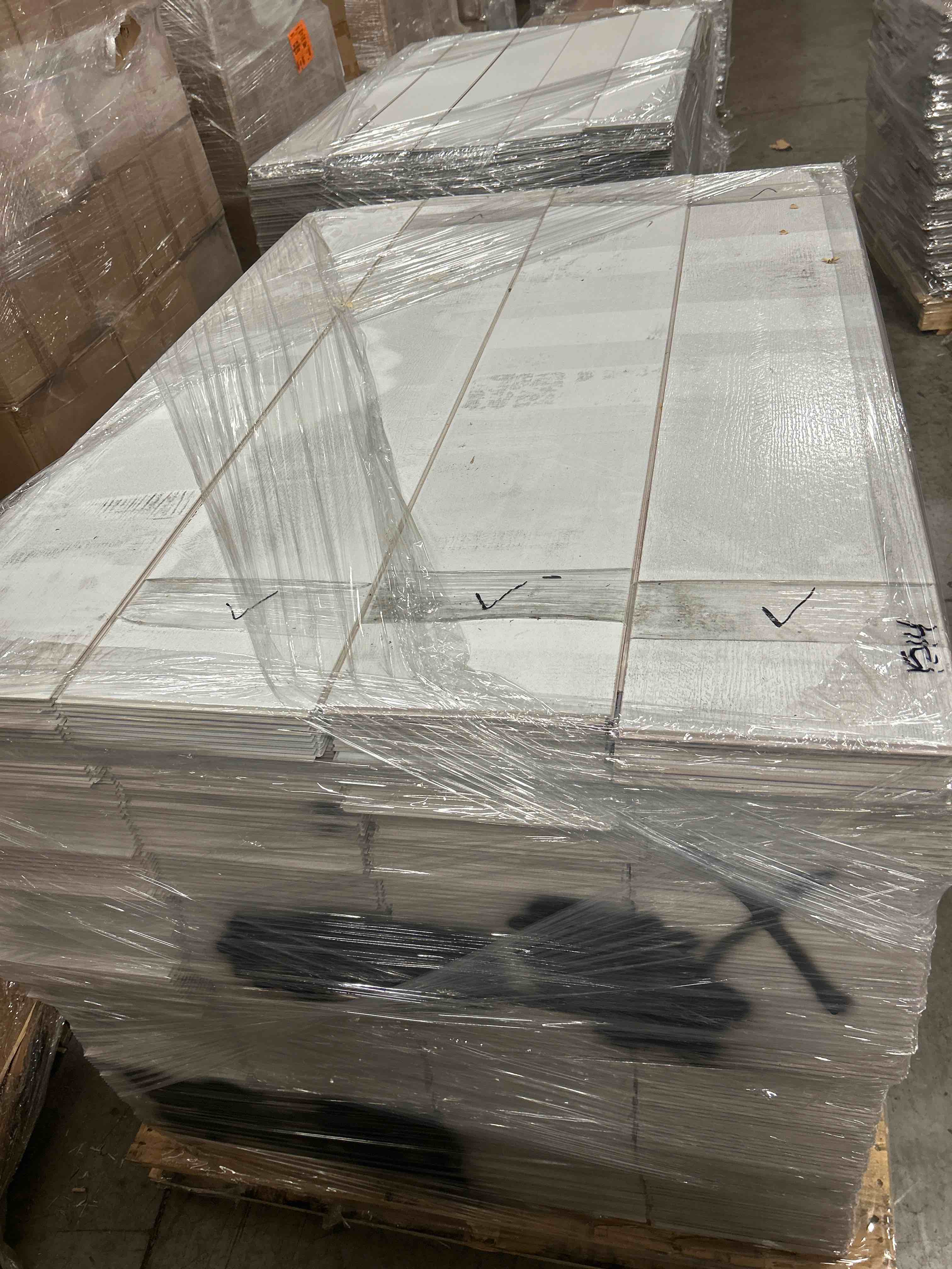 LVP Flooring with Attached Pad Mixed Planks 8.5” x 47.5”  Approx 1514 sq ft - bid per sq ft 