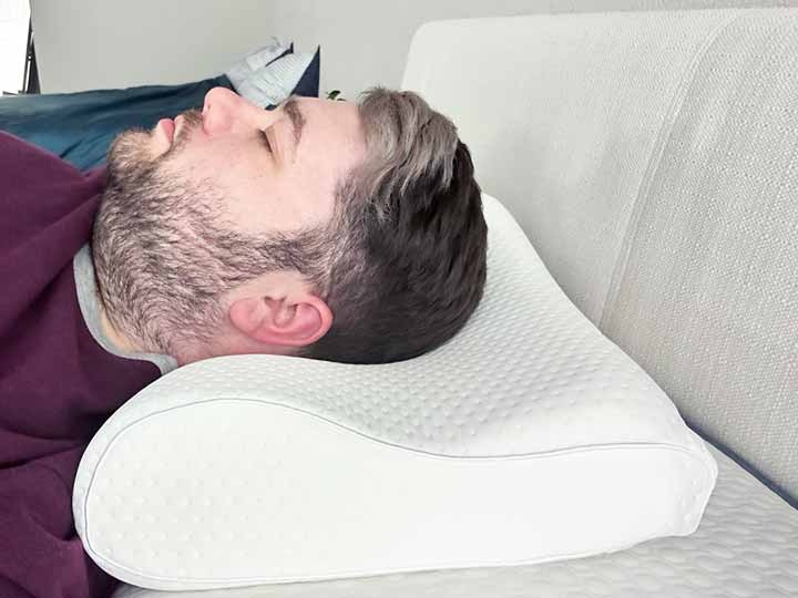 The ergonomic shape to the TEMPUR-Neck pillow makes it an ideal pillow for anyone dealing with neck pain. This solid slab of memory foam will contour to your head and neck, giving you good support and will alleviate neck pain.