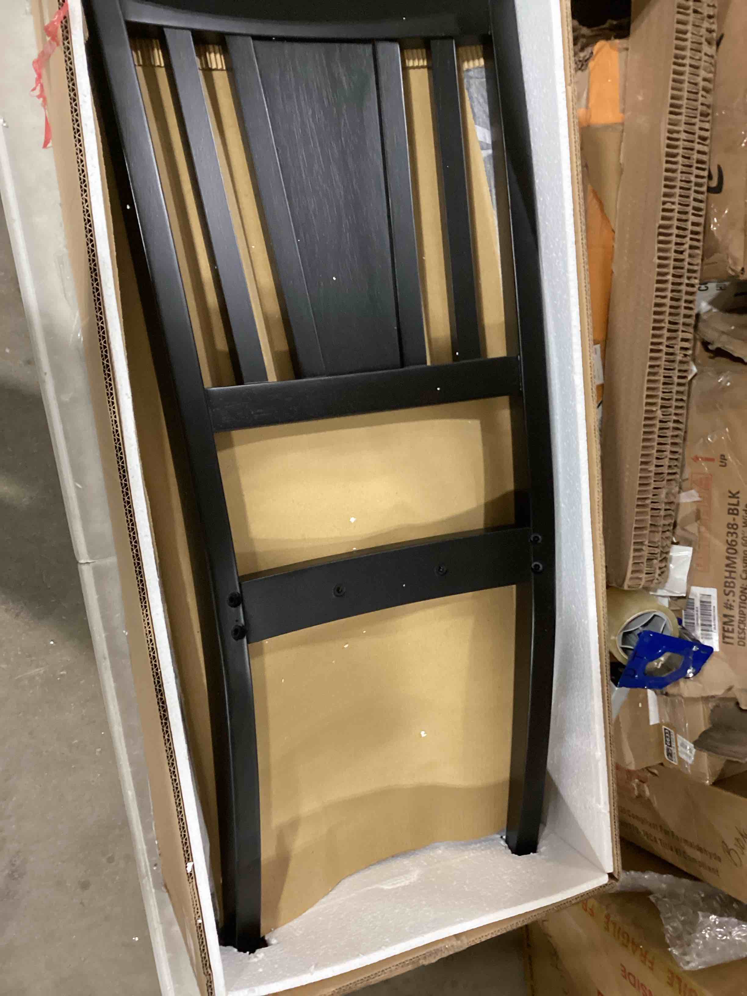2 black finished wood chairs