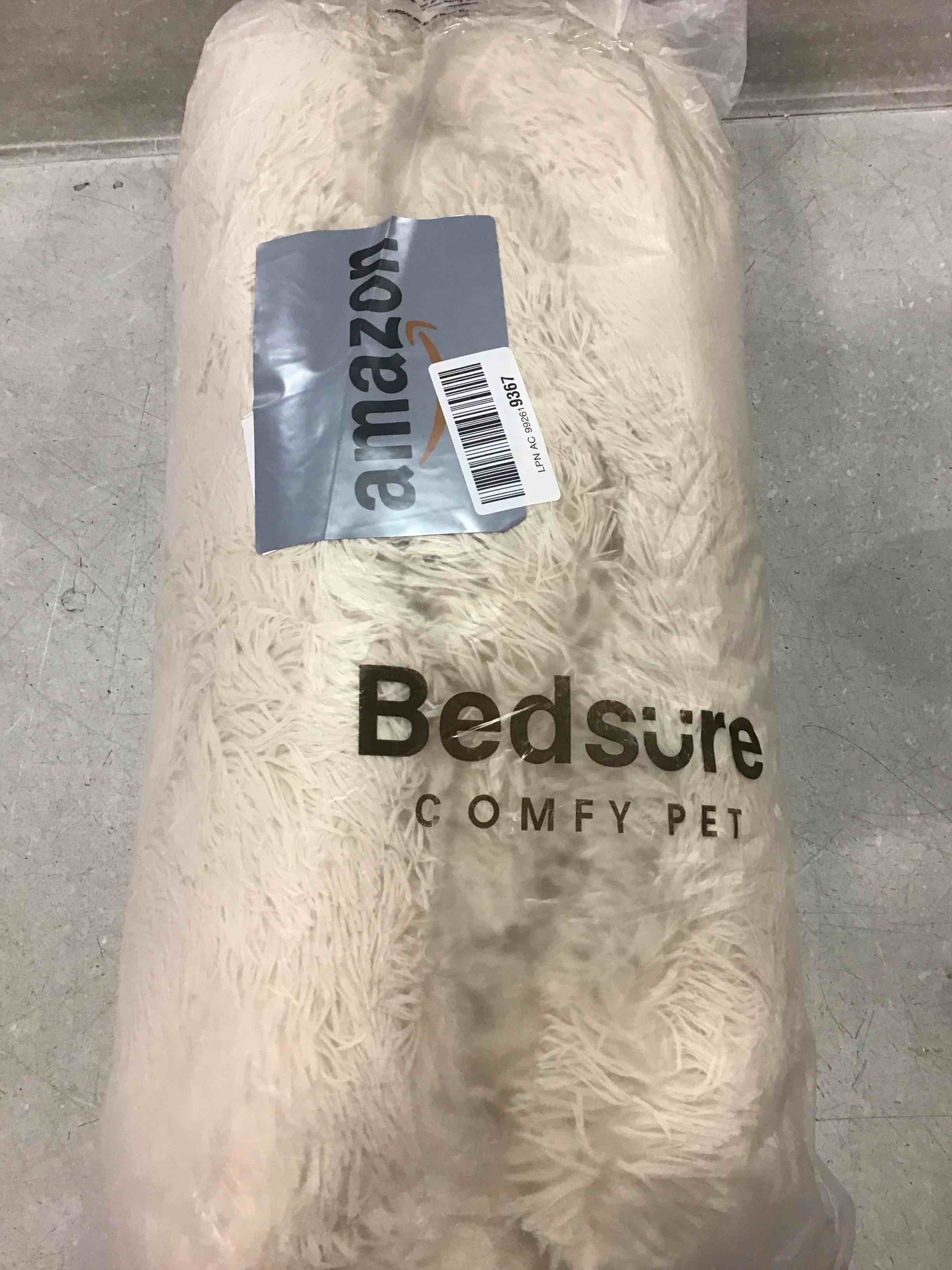 Bedsure Calming Dog Bed for Small Dogs - Donut Washable Small Pet Bed, Round Anti Anxiety Fluffy Plush Faux Fur Large Cat Bed, Fits up to 25 lbs Pets, Oat Milk, 23 inches