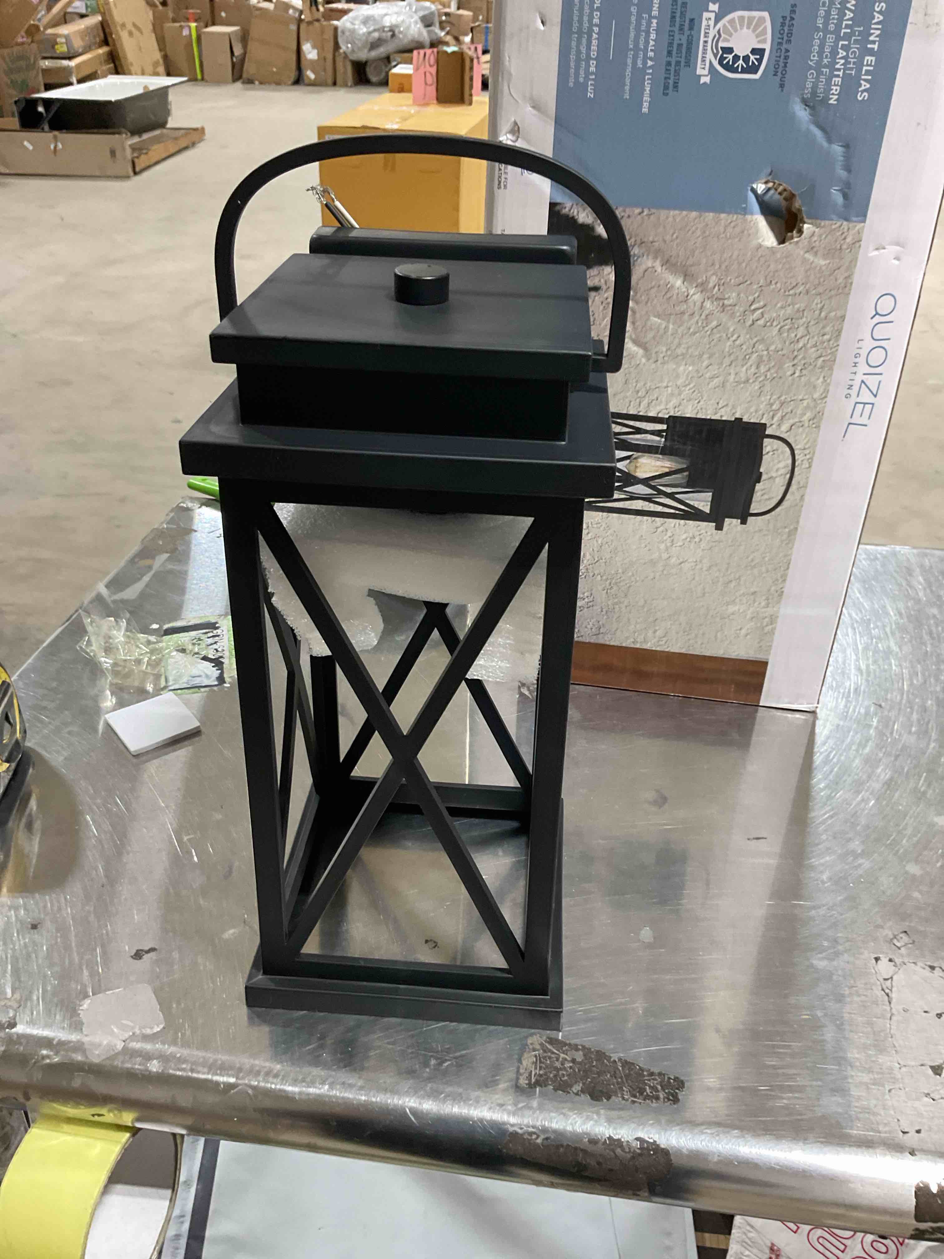 QUOIZEL lighting Saint Elias one light wall matte black finish clear seedy glass