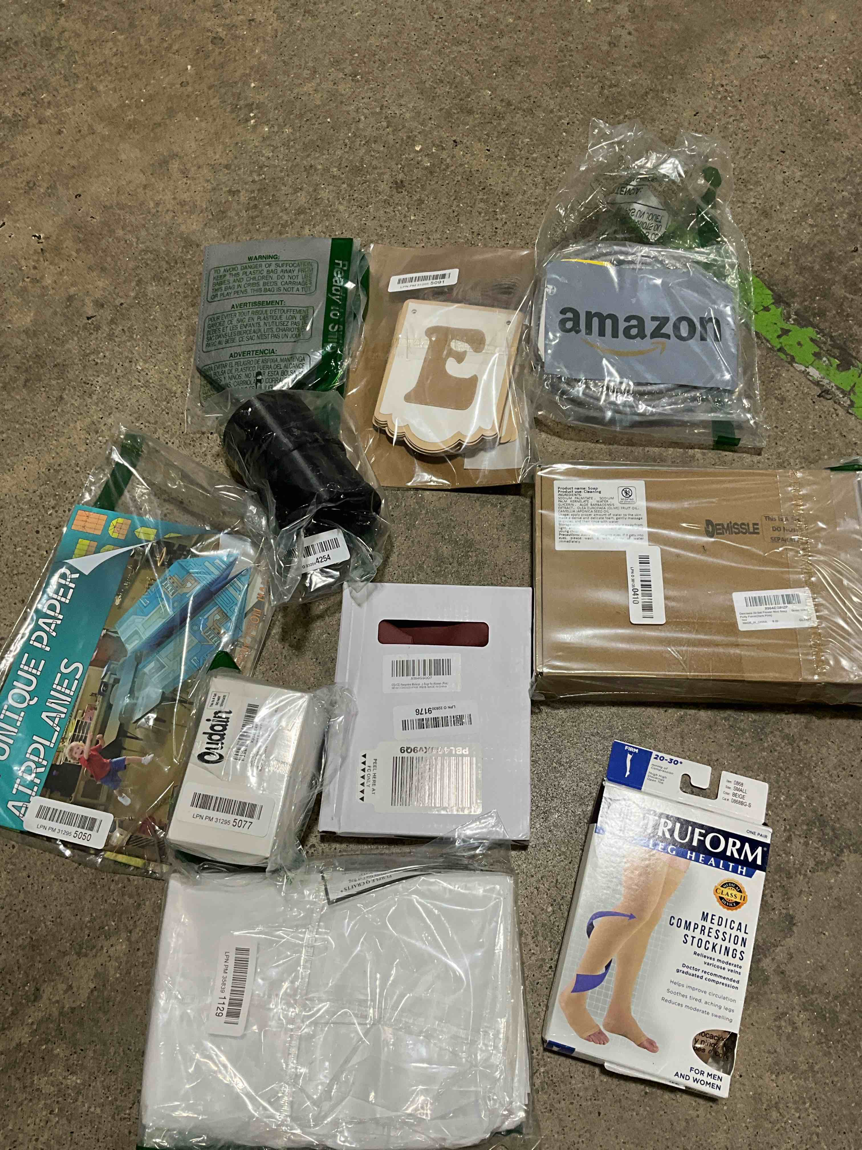 Assorted Paper Decoration, Makeup Bag, Flower Shaped Soap, Compression Stockings, Cut Bags, And Others