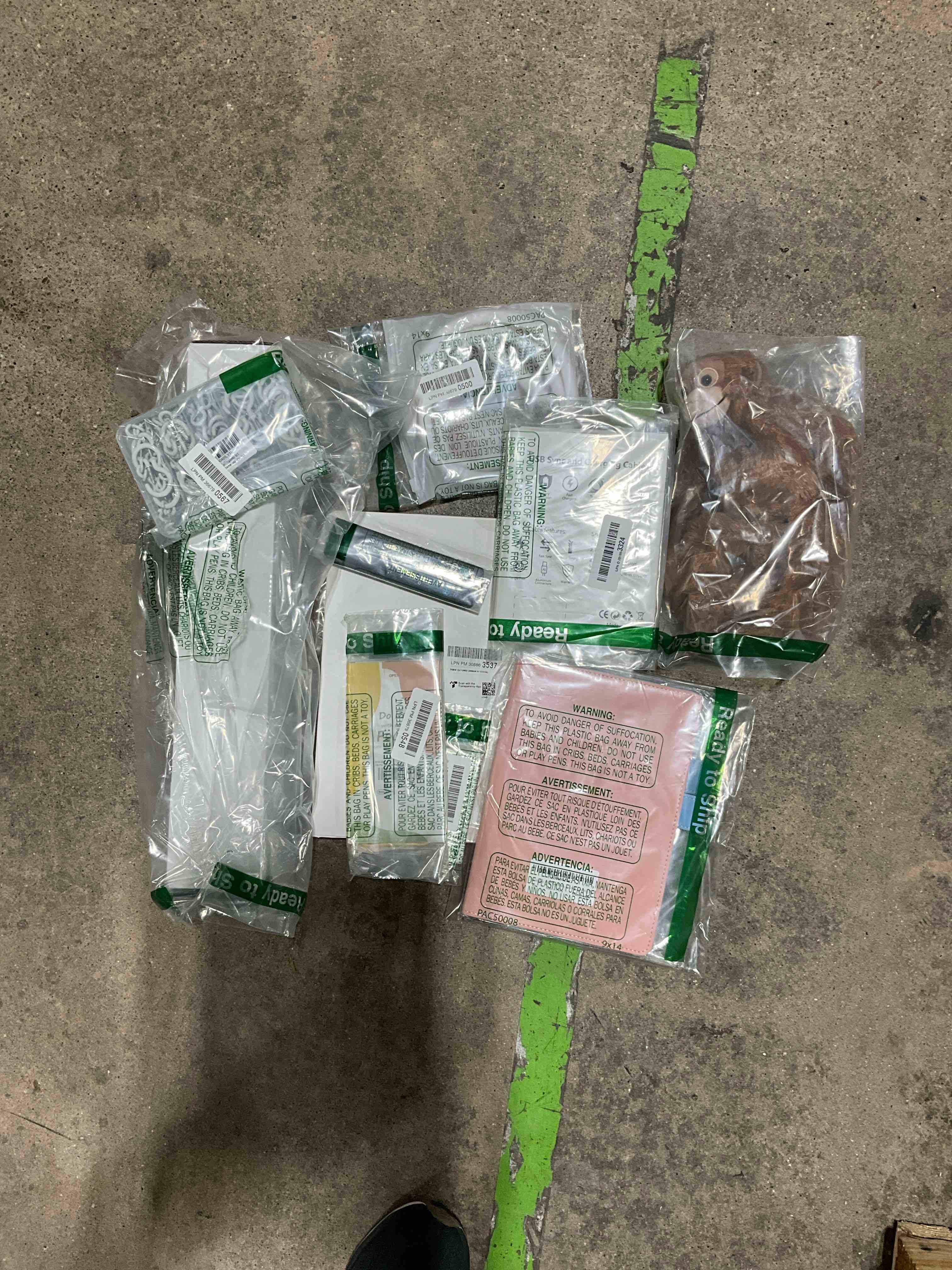 Assorted: Hanging toy, Charging cable,  Phone case iPhone 14 Pro, Leather cover For Notebook, White Ceiling Hooks Kit, 39” Cord Hider.