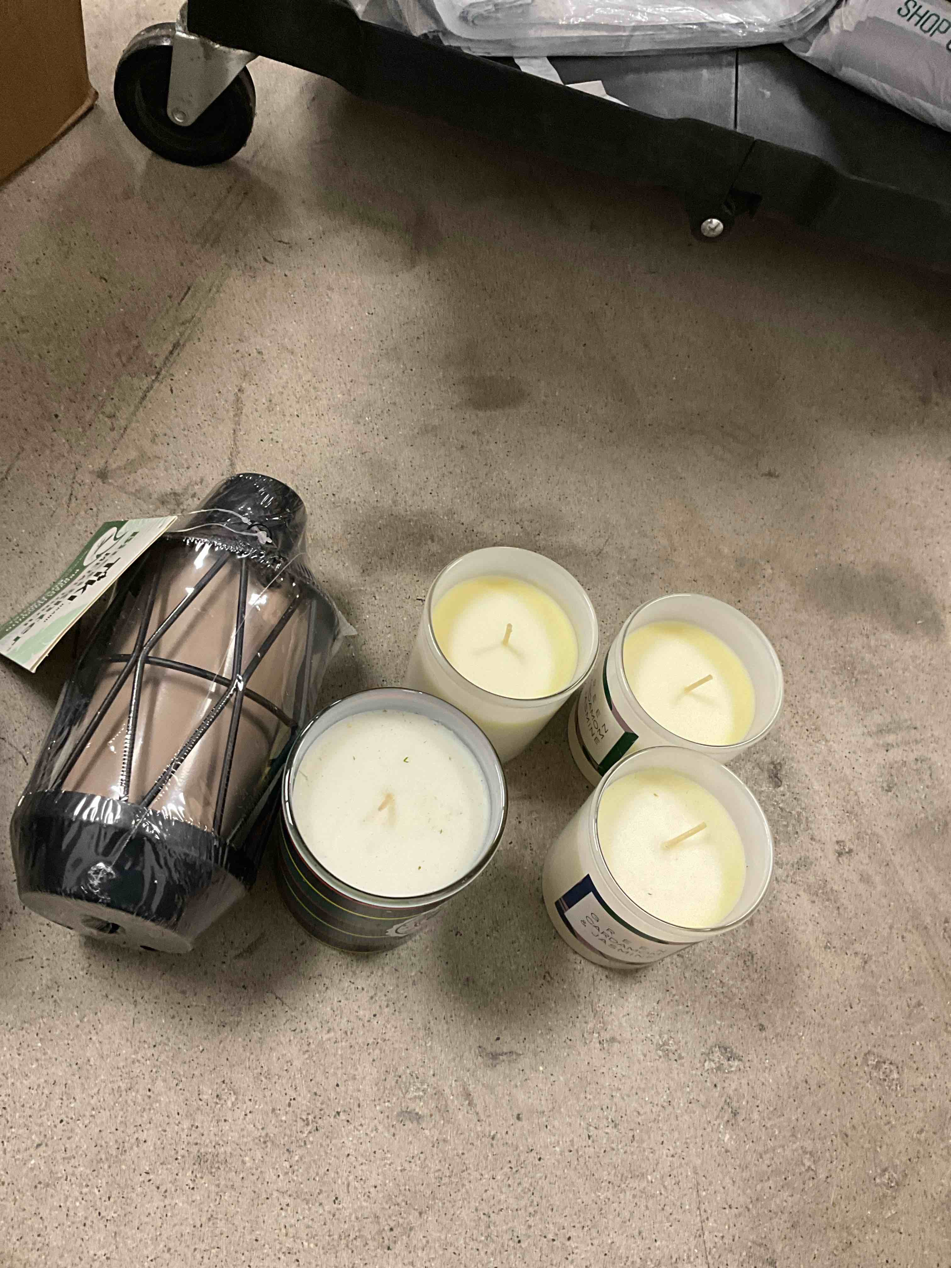 Assorted Candles and metal Torch