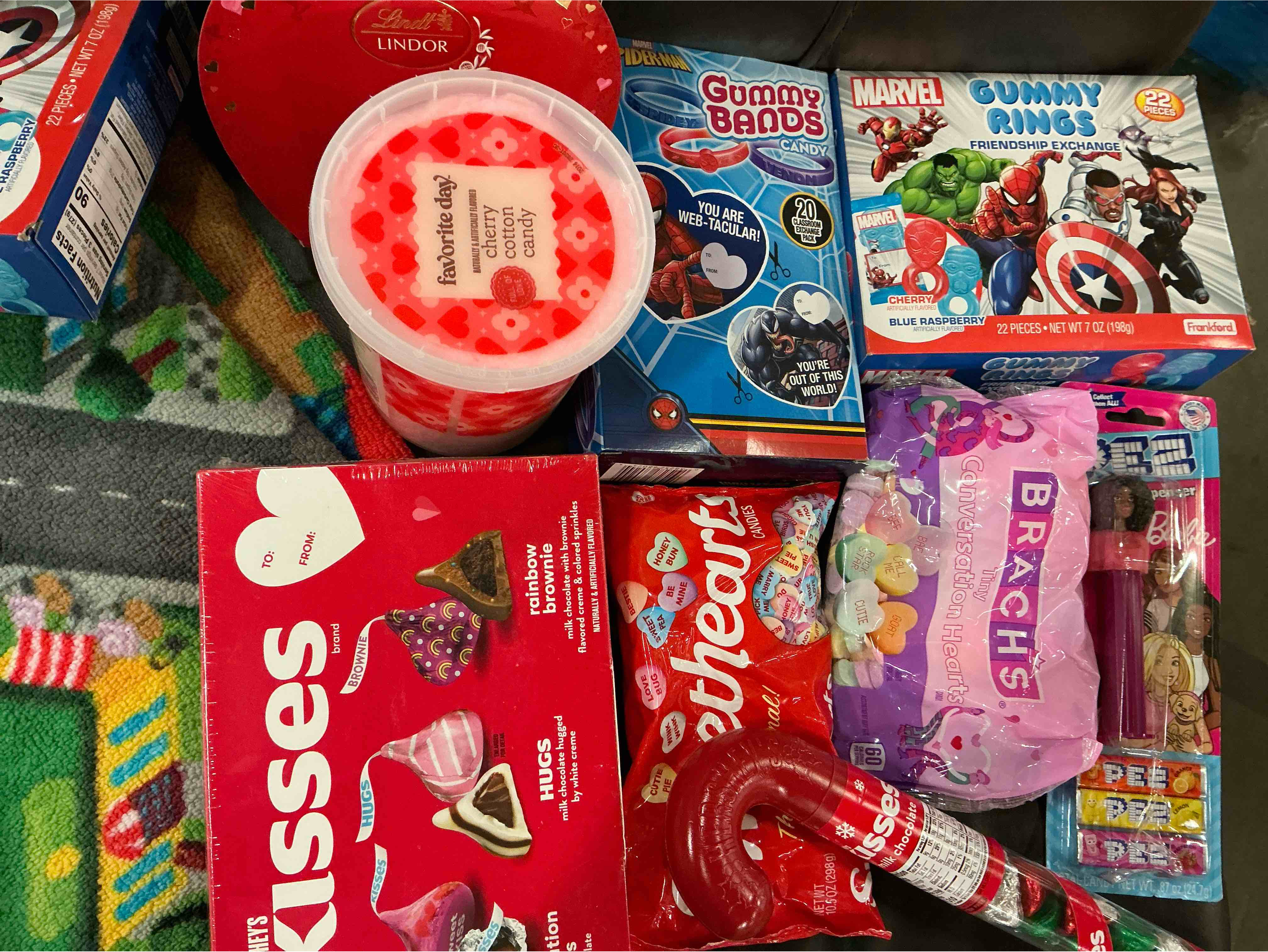 Assortment of sweets of different flavors(included Gummy Bands/Kisses/Brachs and more 