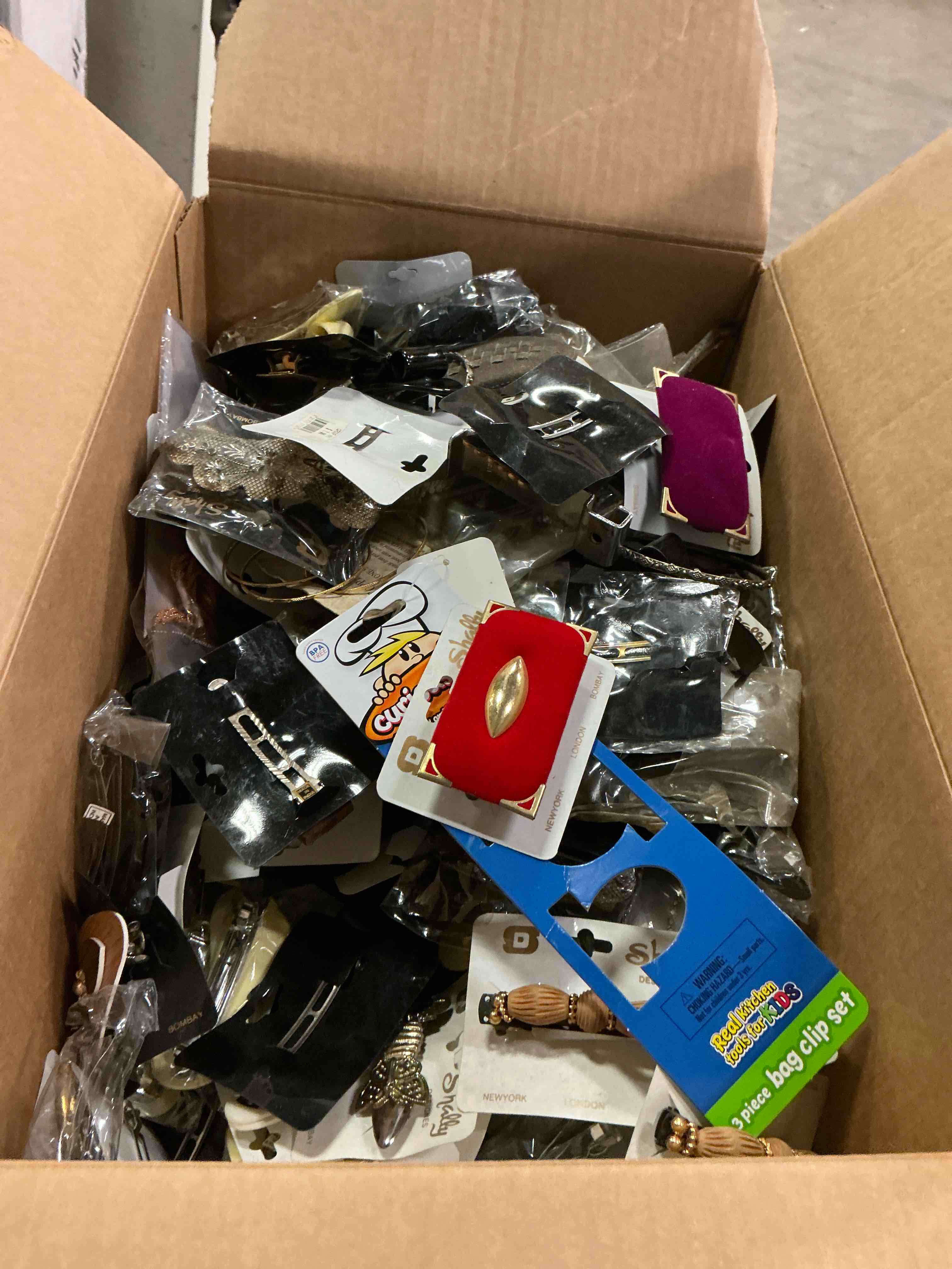 Hair accessories of different styles and colors (1 box full of hair accessories)