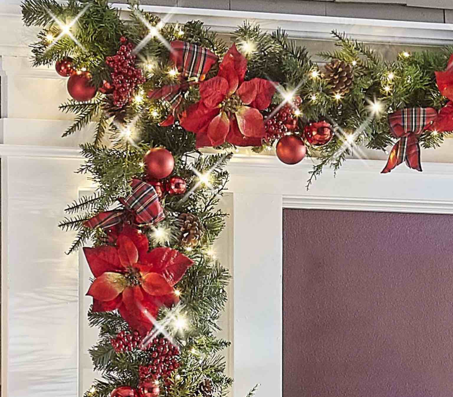 the cordless prelit poinsettia and ribbon holiday trim