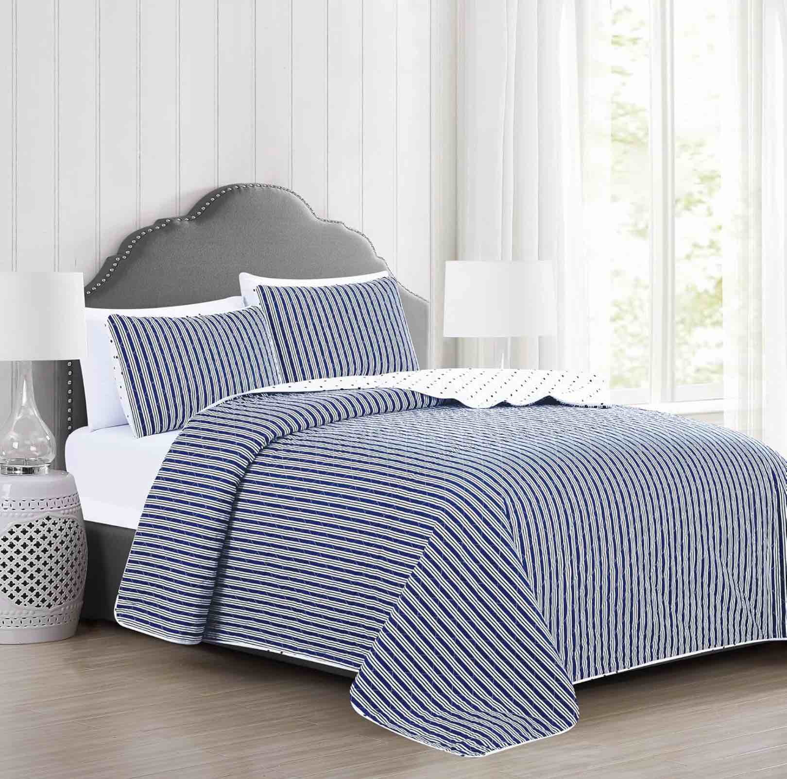 Condition photo showing Good Condition for market & place 2 piece reversible quilt set with sham | all-season soft & lightweight bedspread with modern striped pattern | nora collection (twin, white/navy) twin white / navy