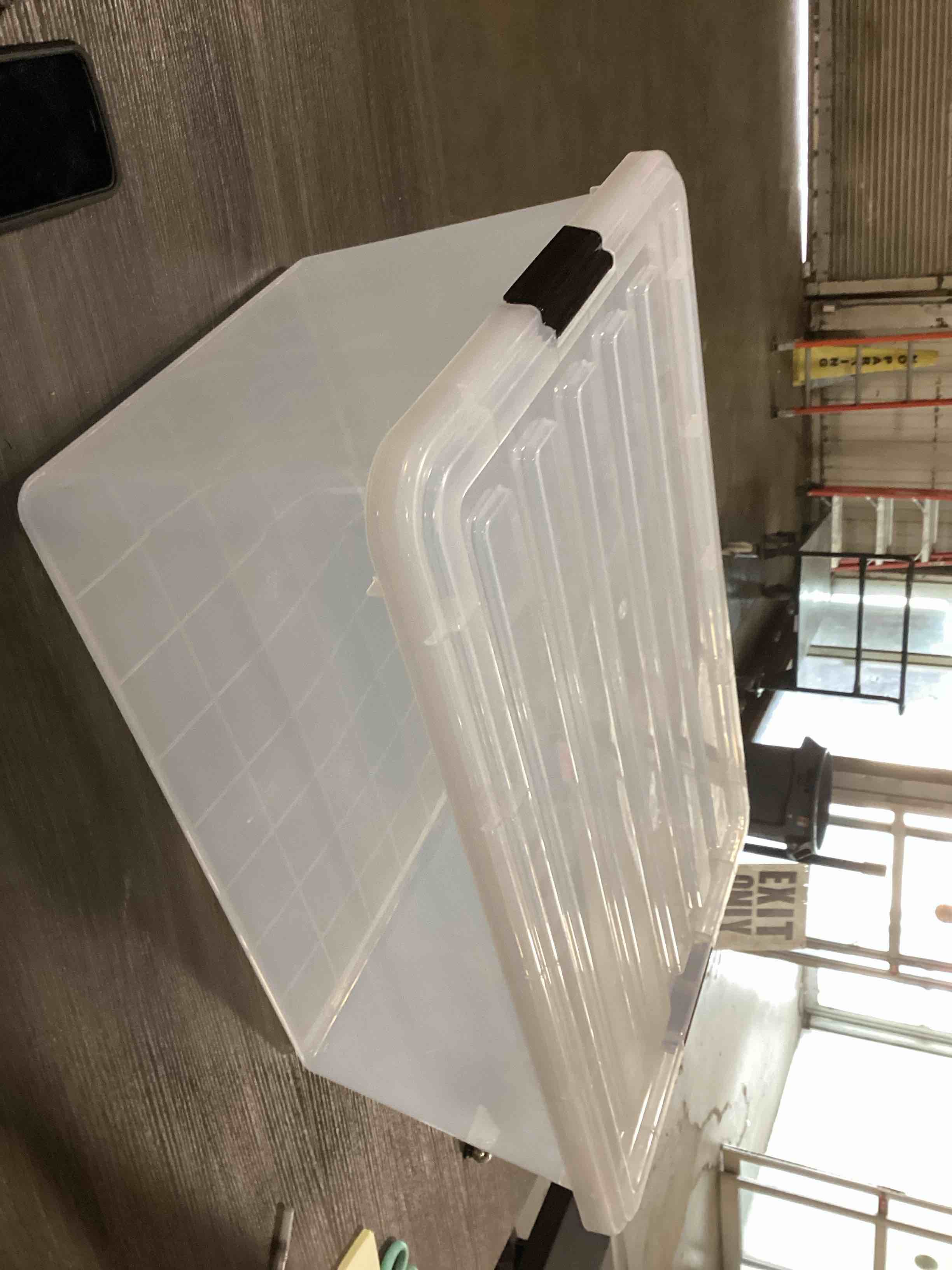 Large clear locking plastic storage bin with lid