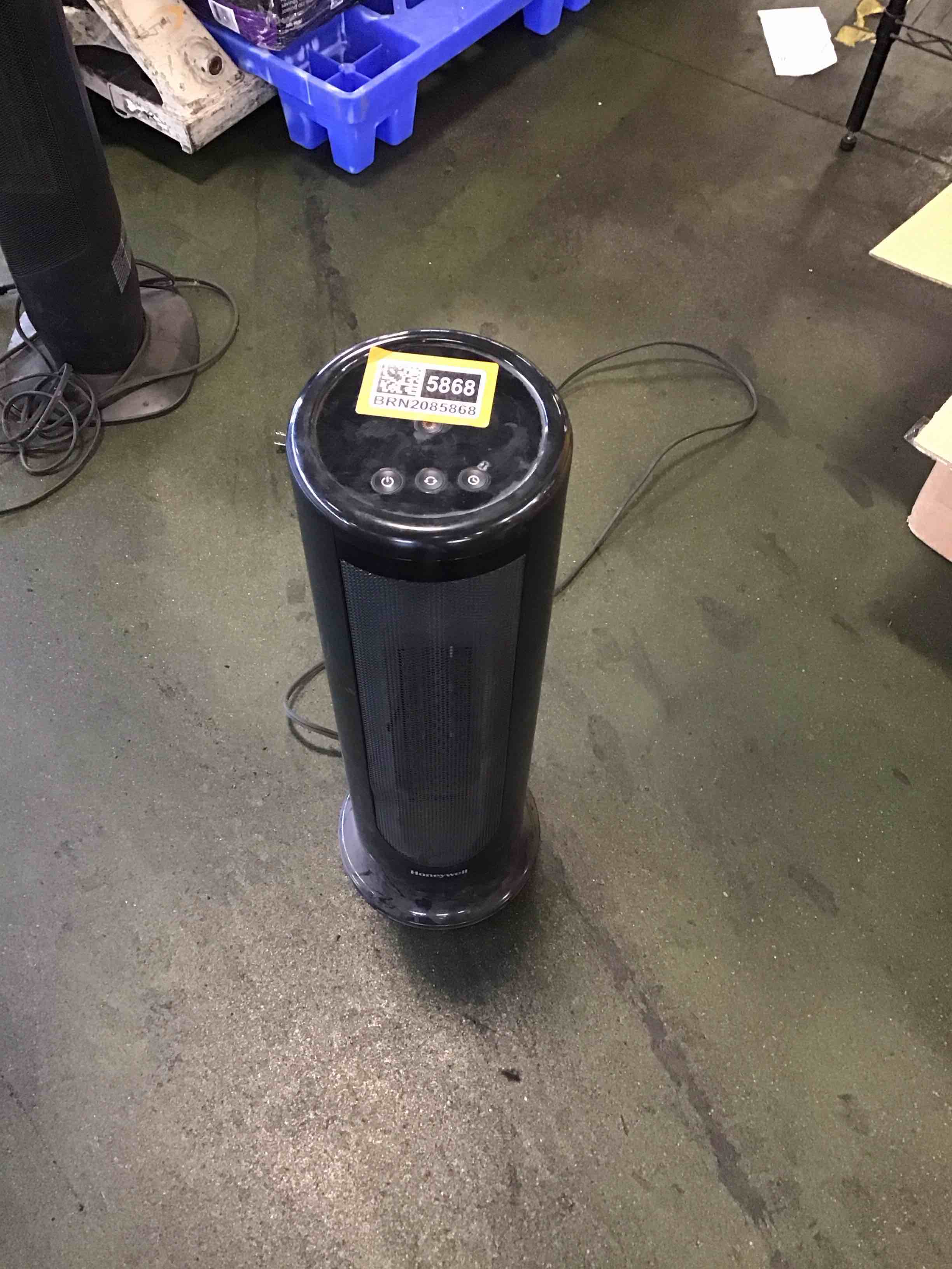 Condition photo showing As Is for Honeywell Vertical Heater