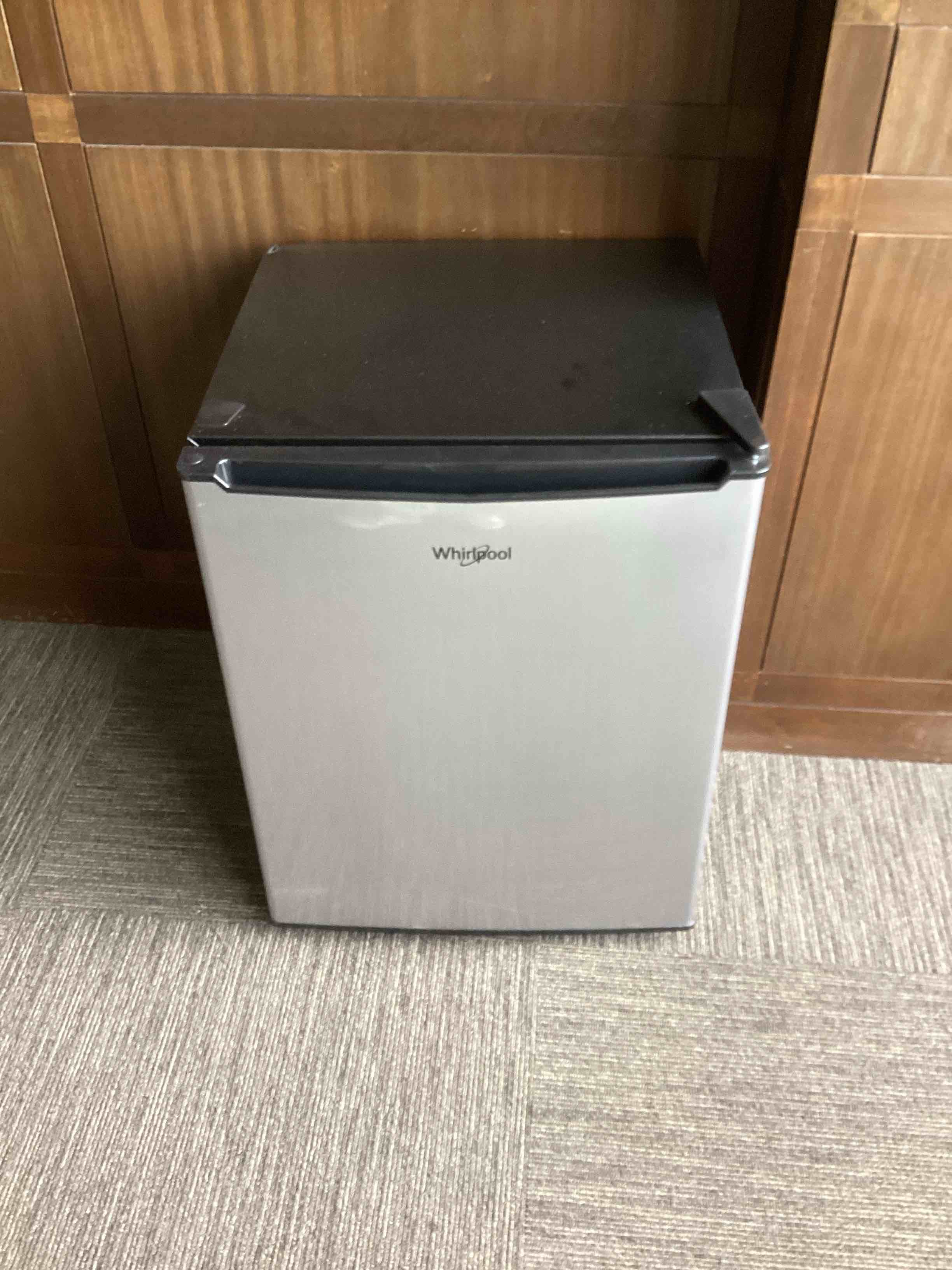 Condition photo showing As Is for whirlpool 2.7 cu ft mini refrigerator - stainless steel - wh27s1e