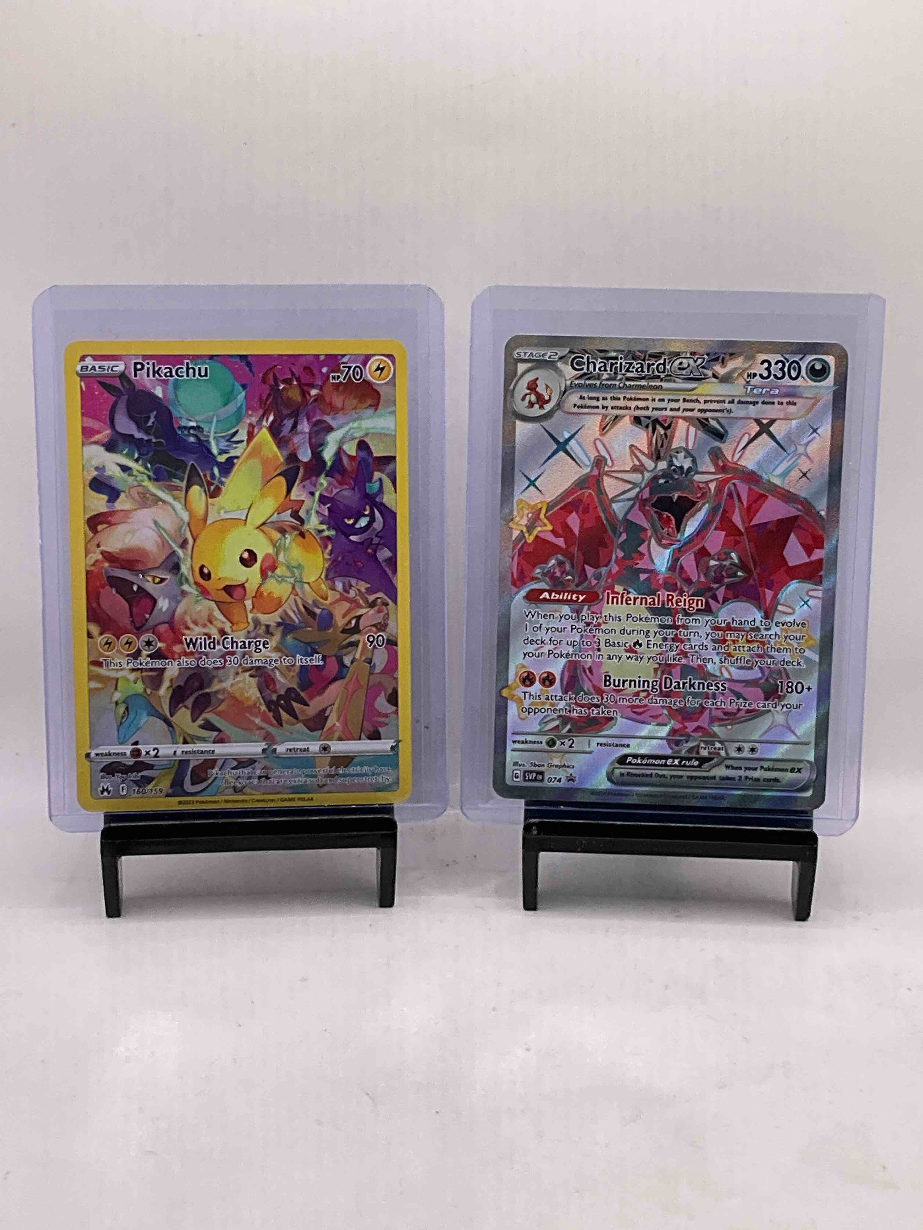 Charizard & Pikachu Rare Pokémon Cards! 2024 Charizard & Pikuchu! Charizard Holo Internal Reign & Burning Darkness, Pikachu Holo Wild Charge, Both Holos! These Two Cards Are Highly Desirable Pokémon Collector Cards. Don’t Miss Out On The Craze, 50 Card Pokémon Craziness! 