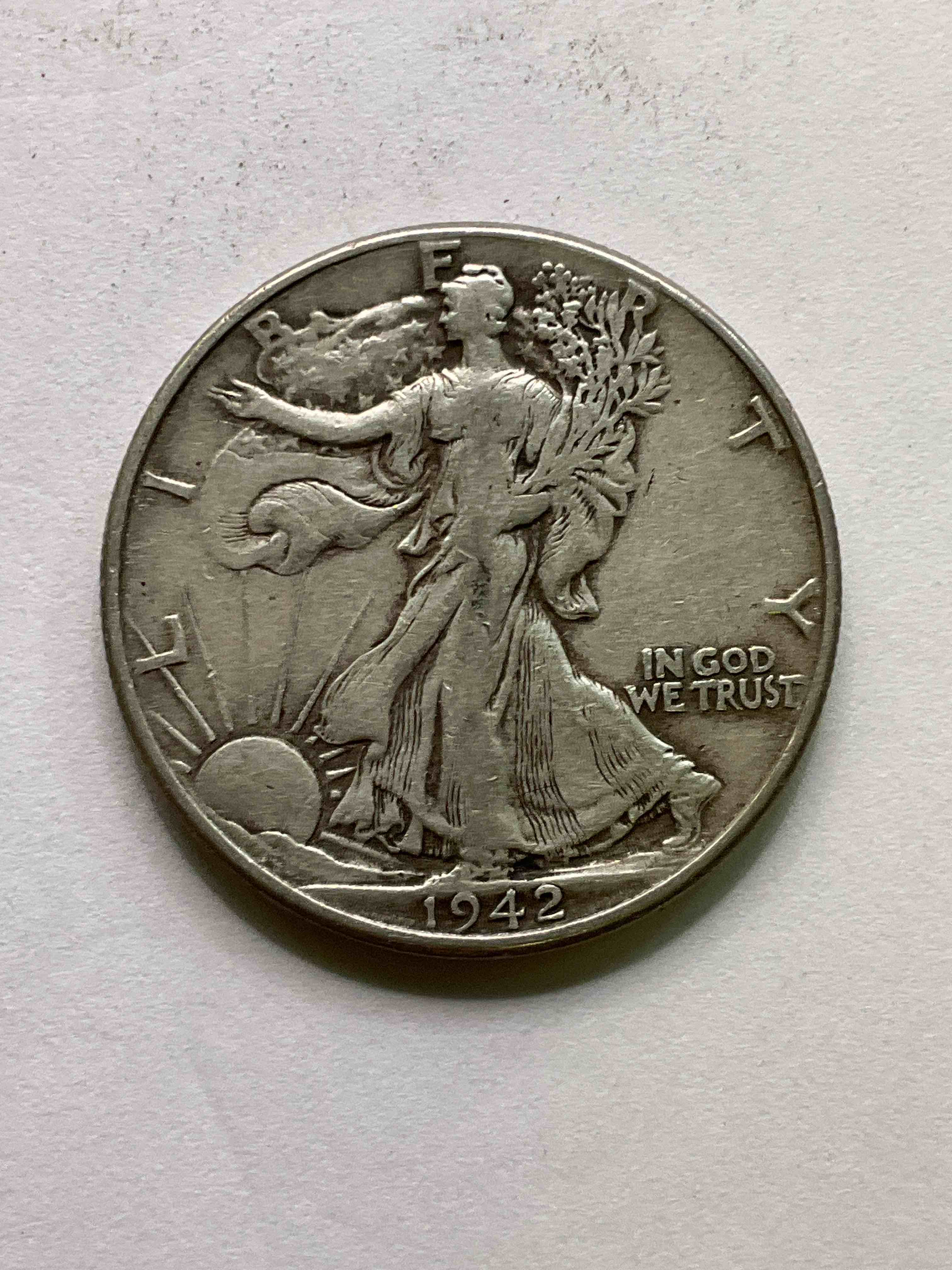World War II Era Silver! Antique U.S. Silver! Liberty Walking Silver Half Dollars! These Striking Half Dollars Were Minted From 1916-1947 & Have Become Some Of The Most Collectible Coins In History! Here Is A Striking Circulated Example,From 1942, Liberty Walking Coins Are 90% Fine U.S. Silver, A Great Investment In Precious Metal!
