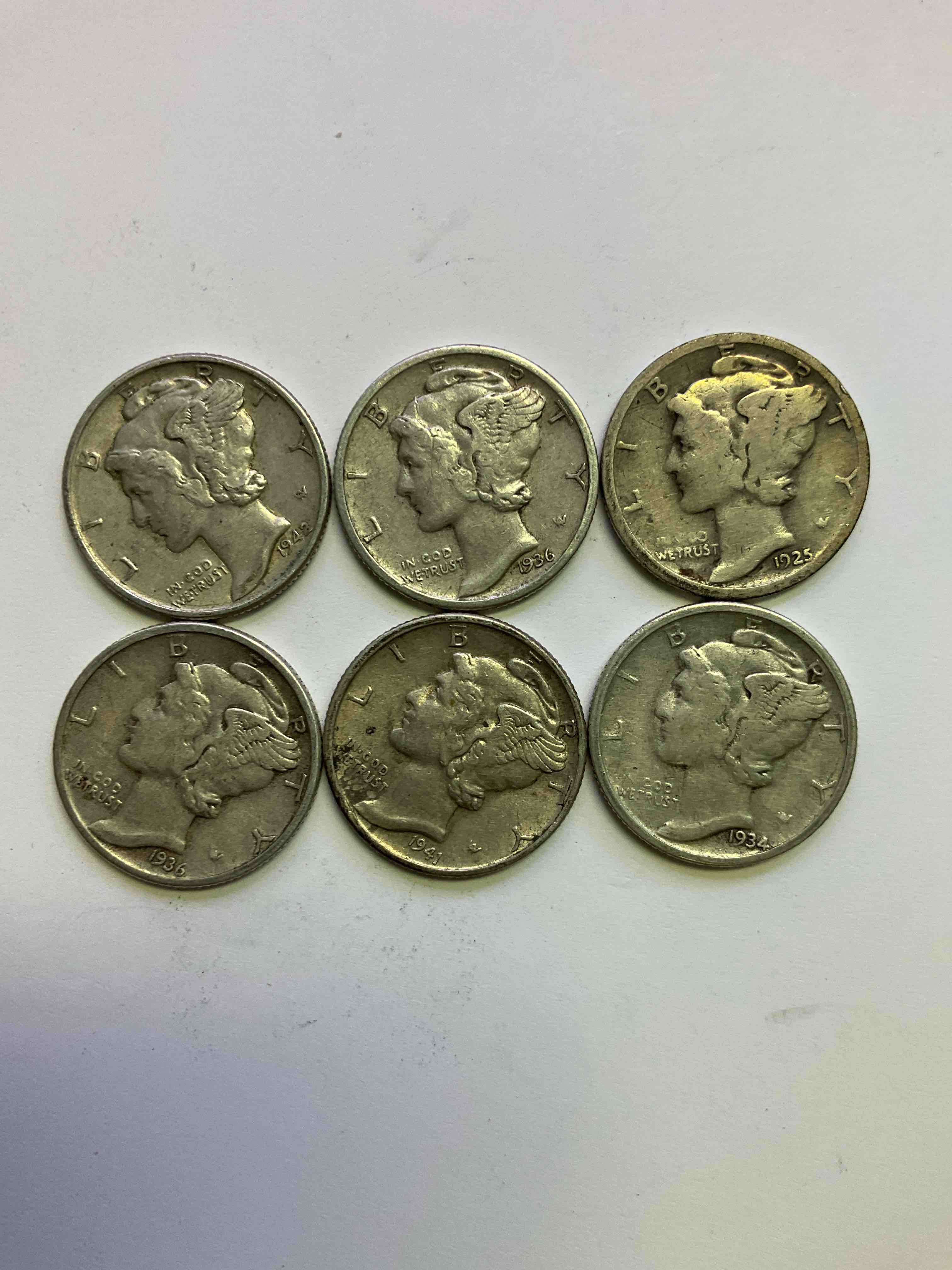 Antique U.S. Pure Fine Silver Mercury Dimes! Silver Mercury Dimes Were Minted From 1916-1945 & Have Become Serious Collector Items! Check Out These Awesome Examples, All In Nice, Circulated Condition With Visible Dates & Varying Years! Rare To Have Visible Dates! Makes For A Great Investment In Precious Metals, Mercury Dimes Are 90% Pure Fine Silver! They Don't Make Em' Like This Anymore!